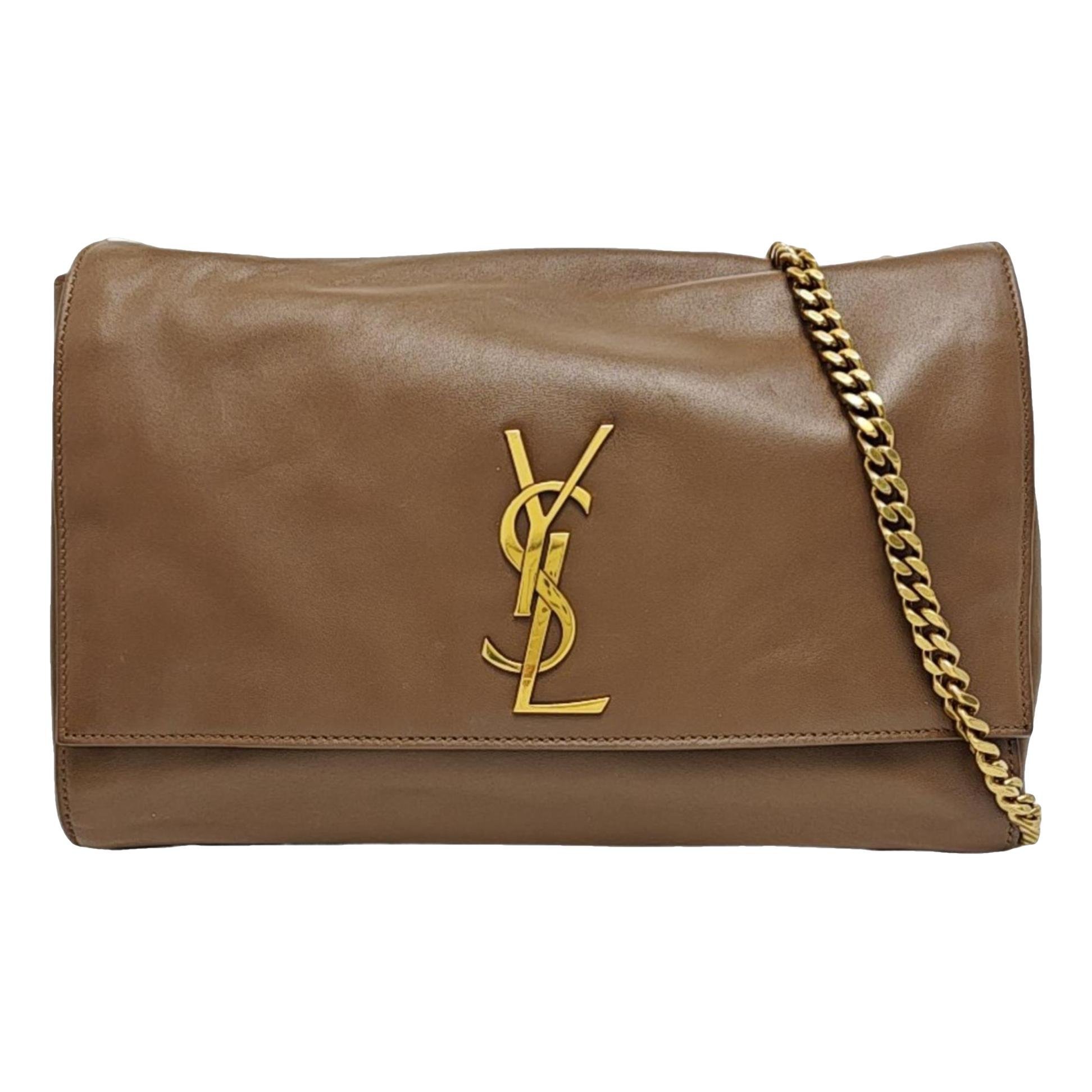 Reversible kate leather crossbody bag