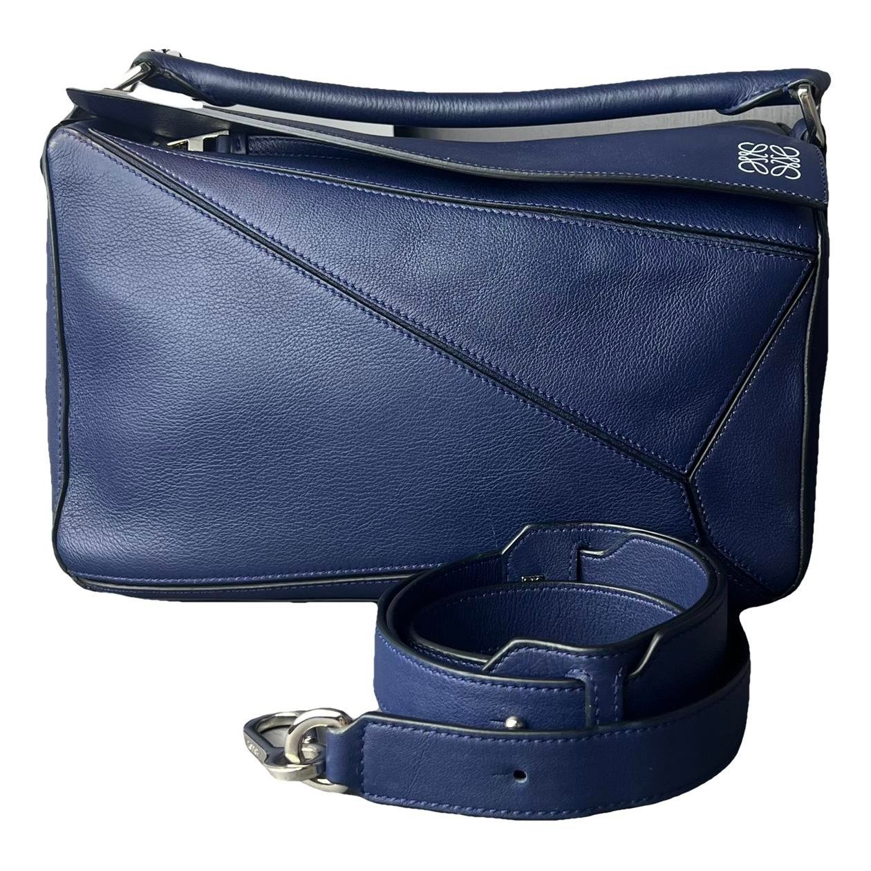 Puzzle leather handbag