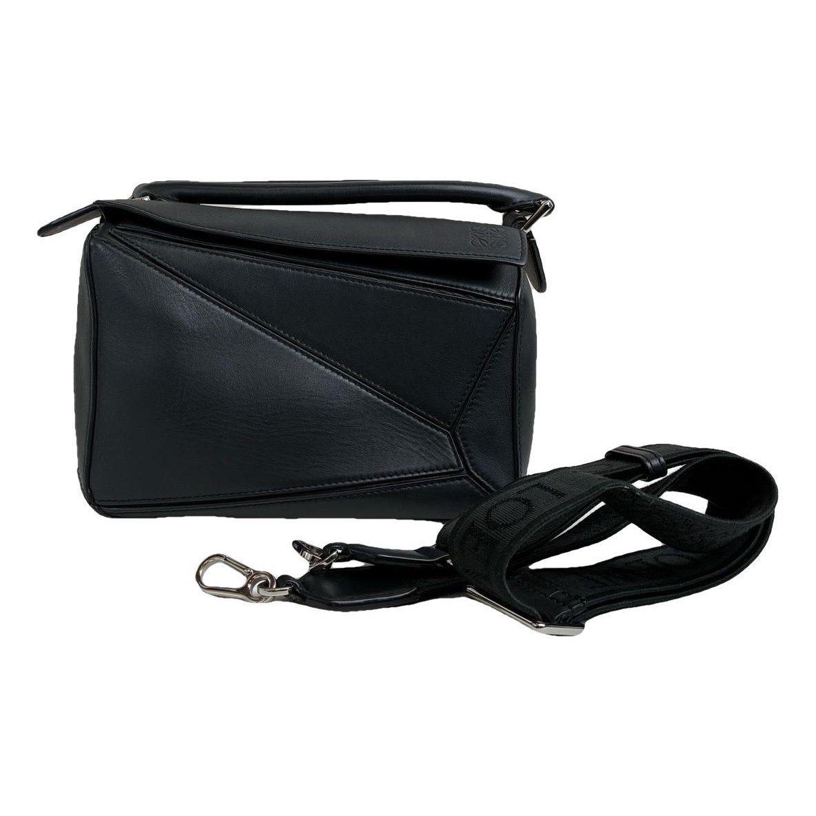 Puzzle leather handbag
