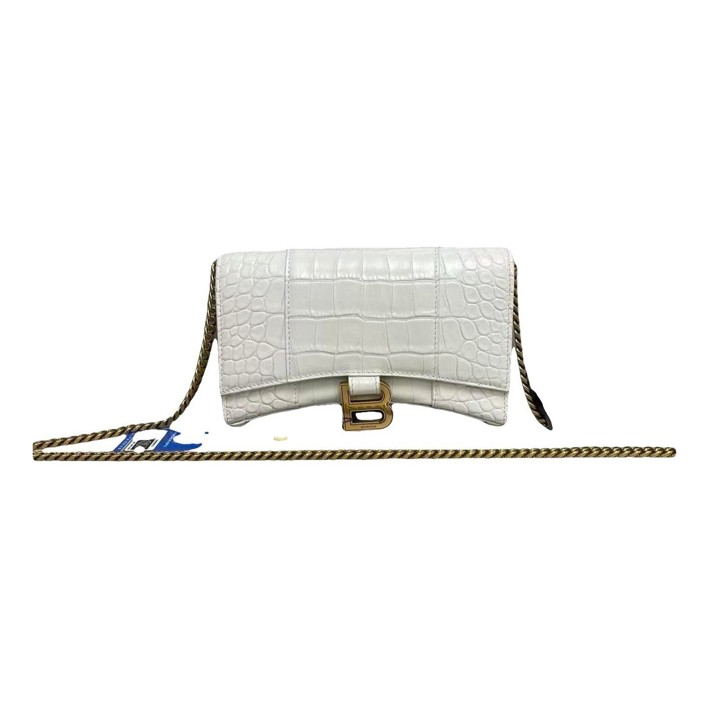 Hourglass leather handbag
