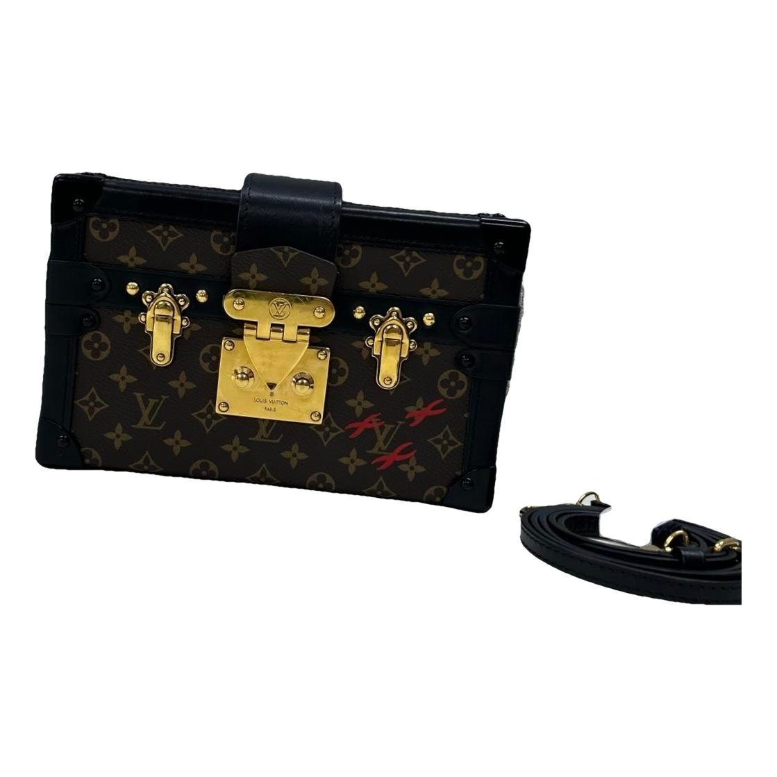 Petite Malle leather handbag
