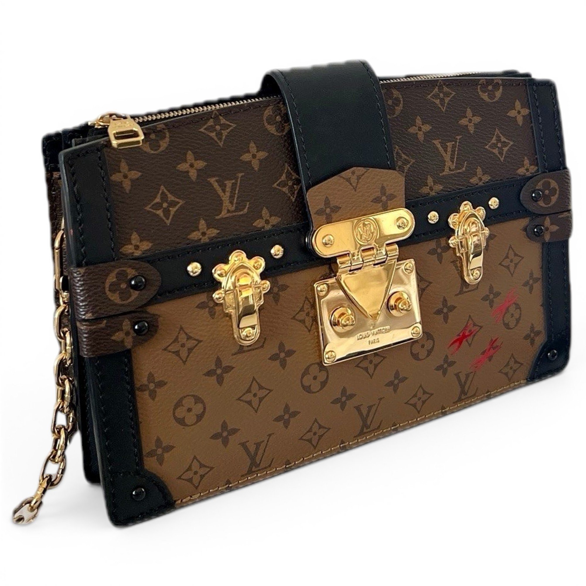 Pochette Trunk leather handbag