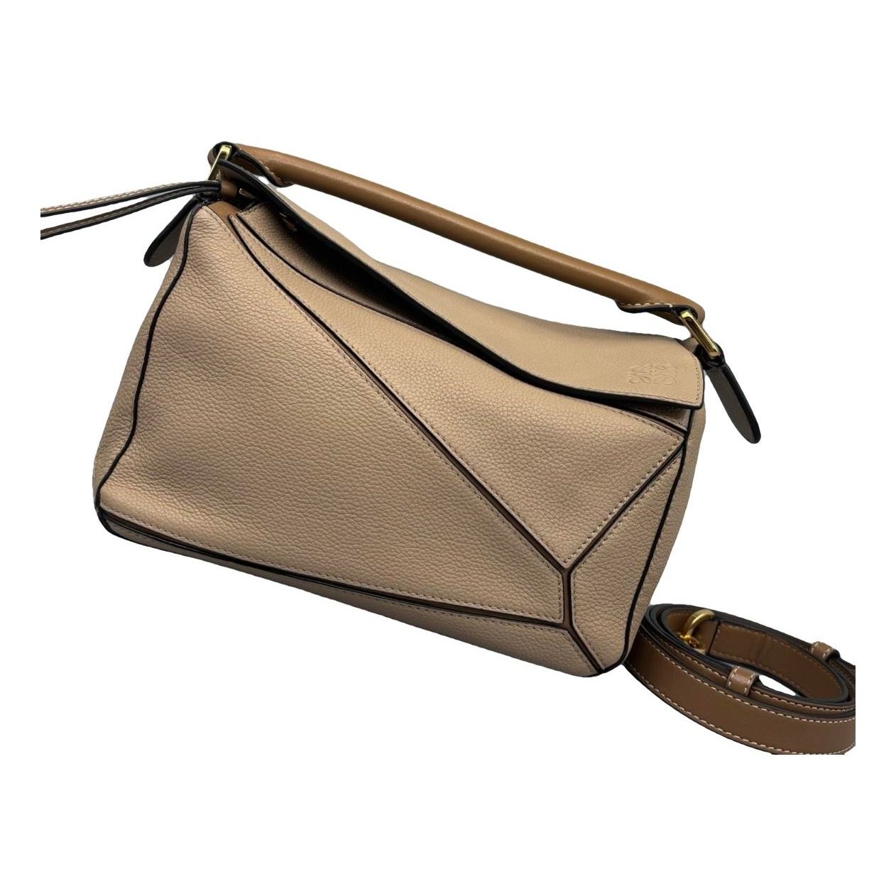 Puzzle leather handbag