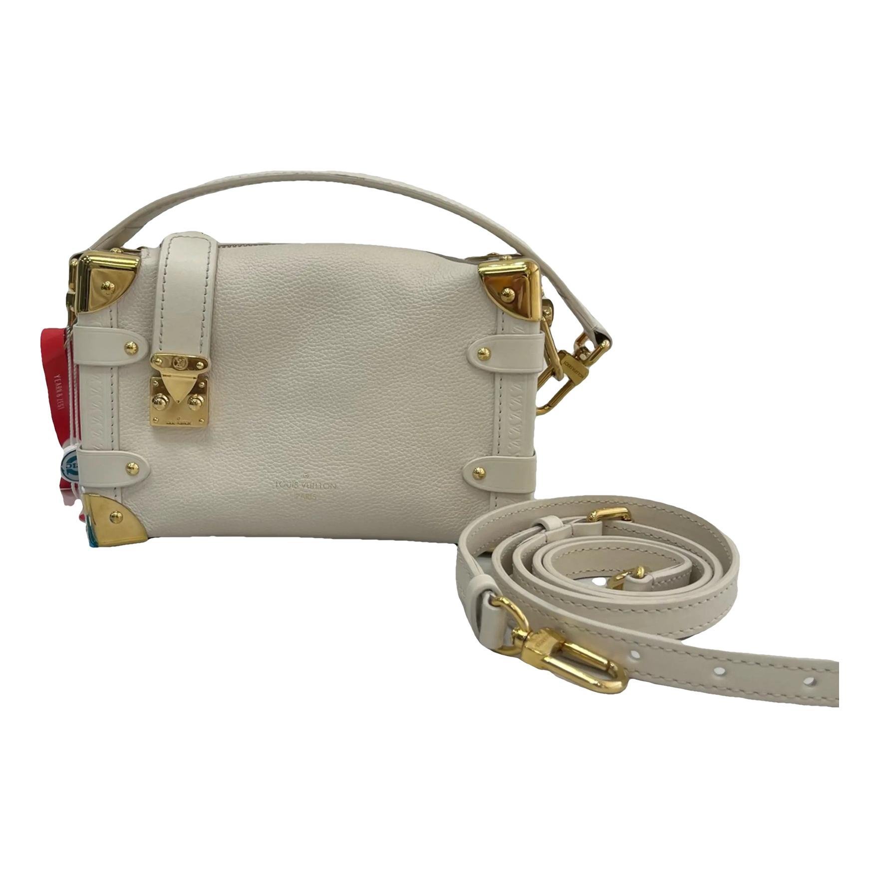 Side Trunk leather crossbody bag