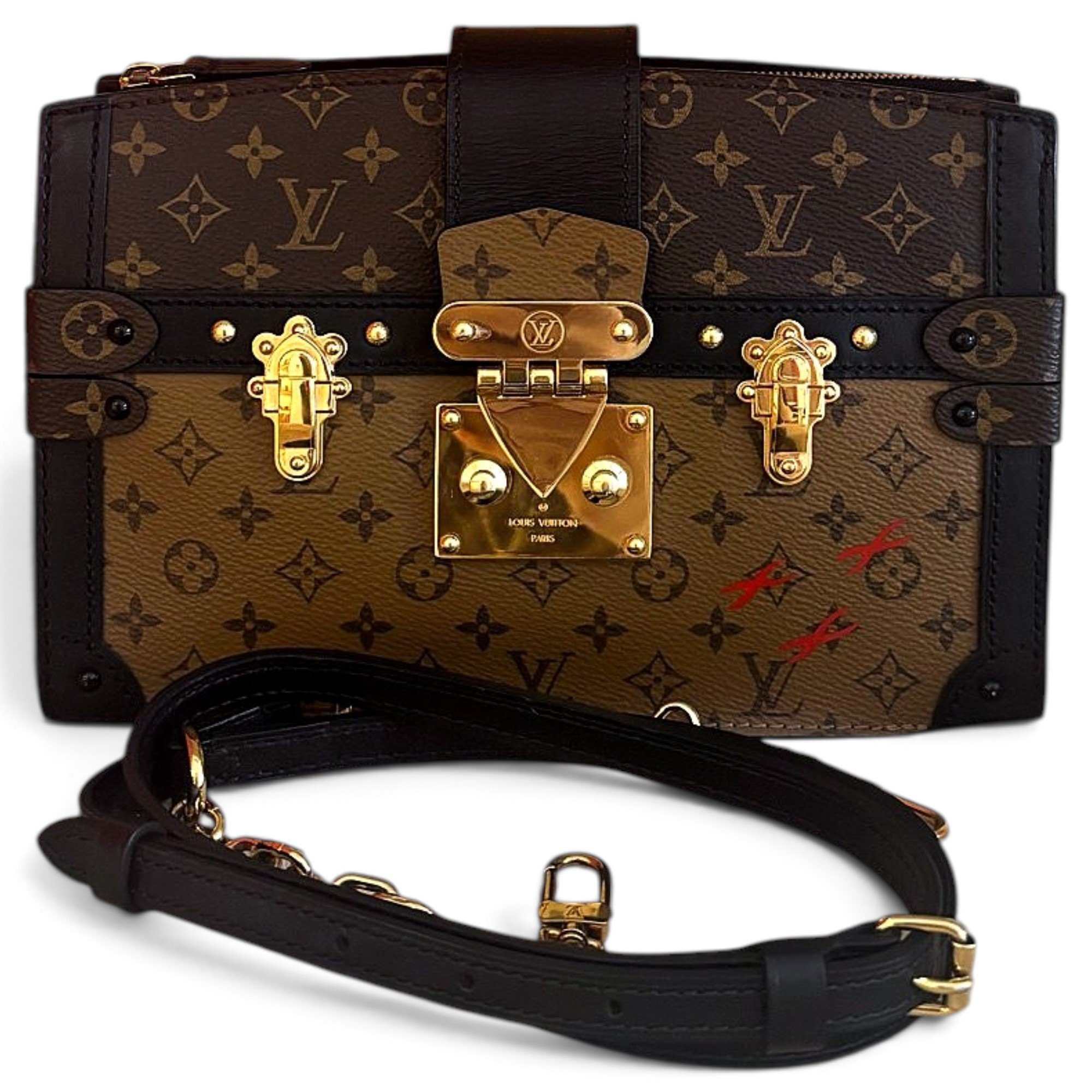 Pochette Trunk leather handbag