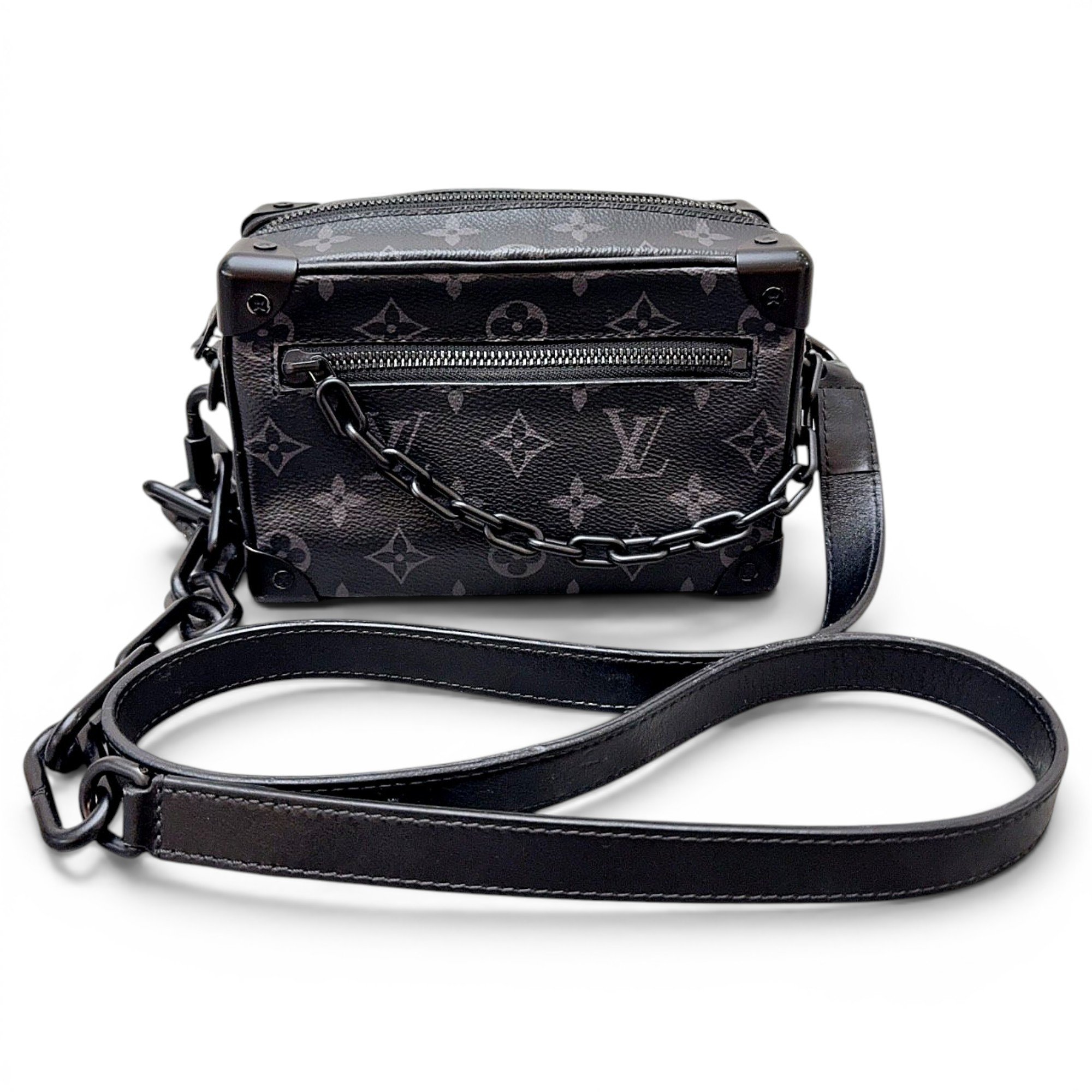 Pochette Trunk leather handbag