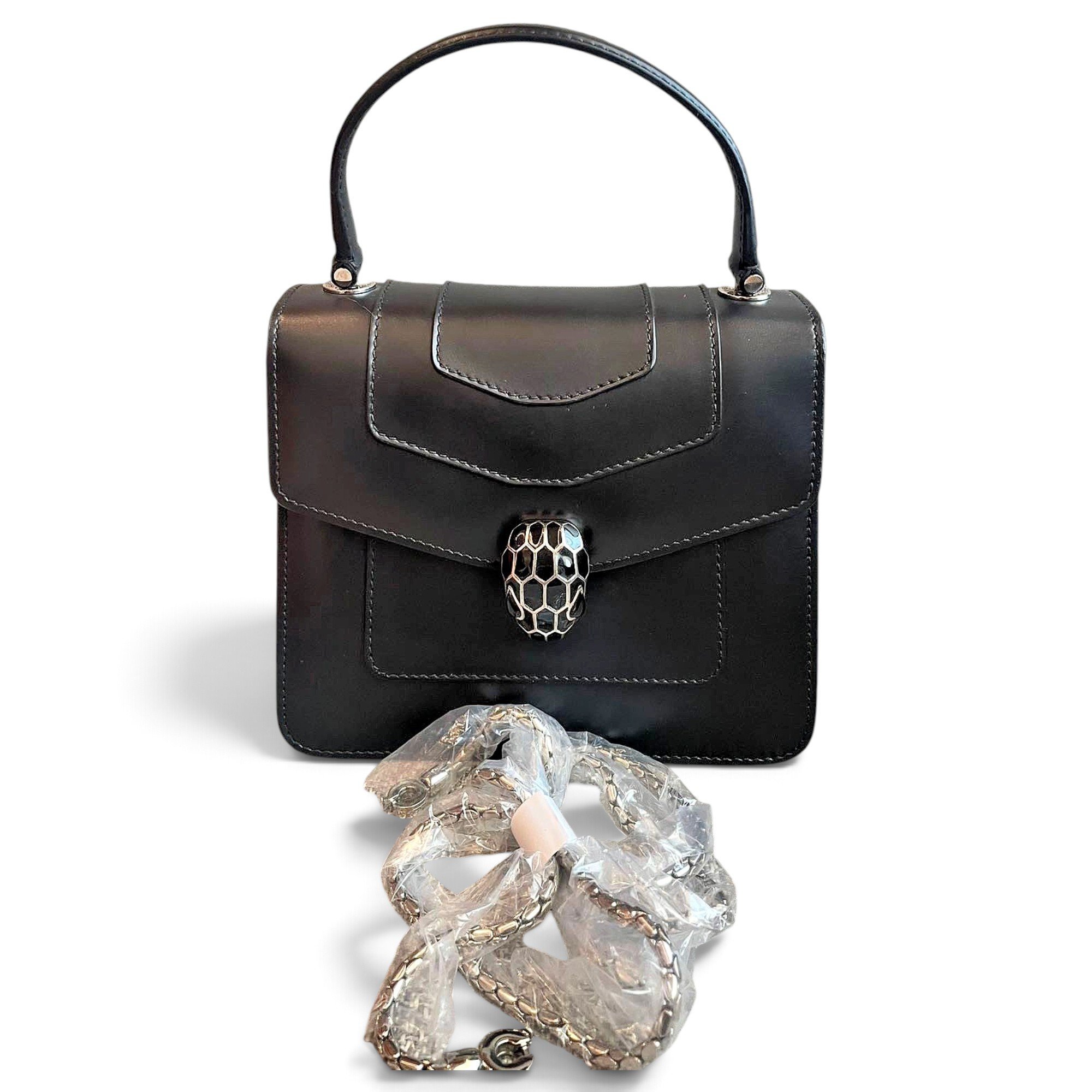 Serpenti leather handbag