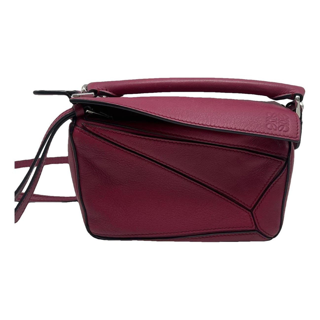 Puzzle leather handbag