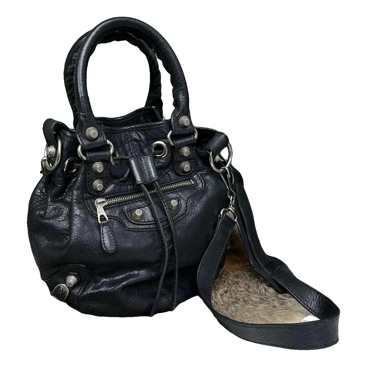 Pompon leather handbag