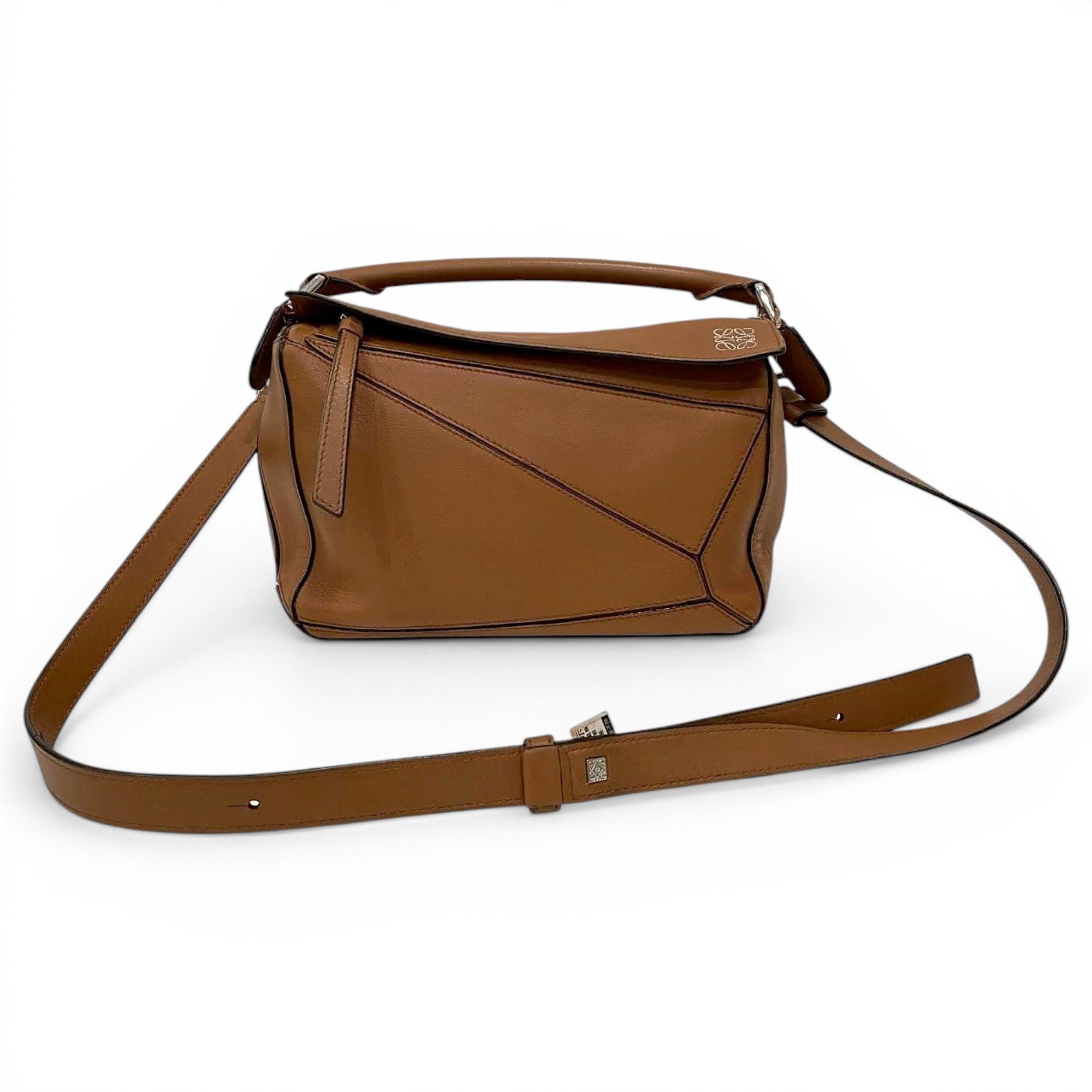 Puzzle leather handbag