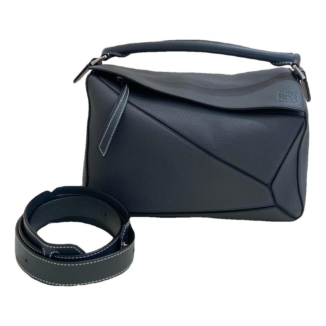 Puzzle leather handbag