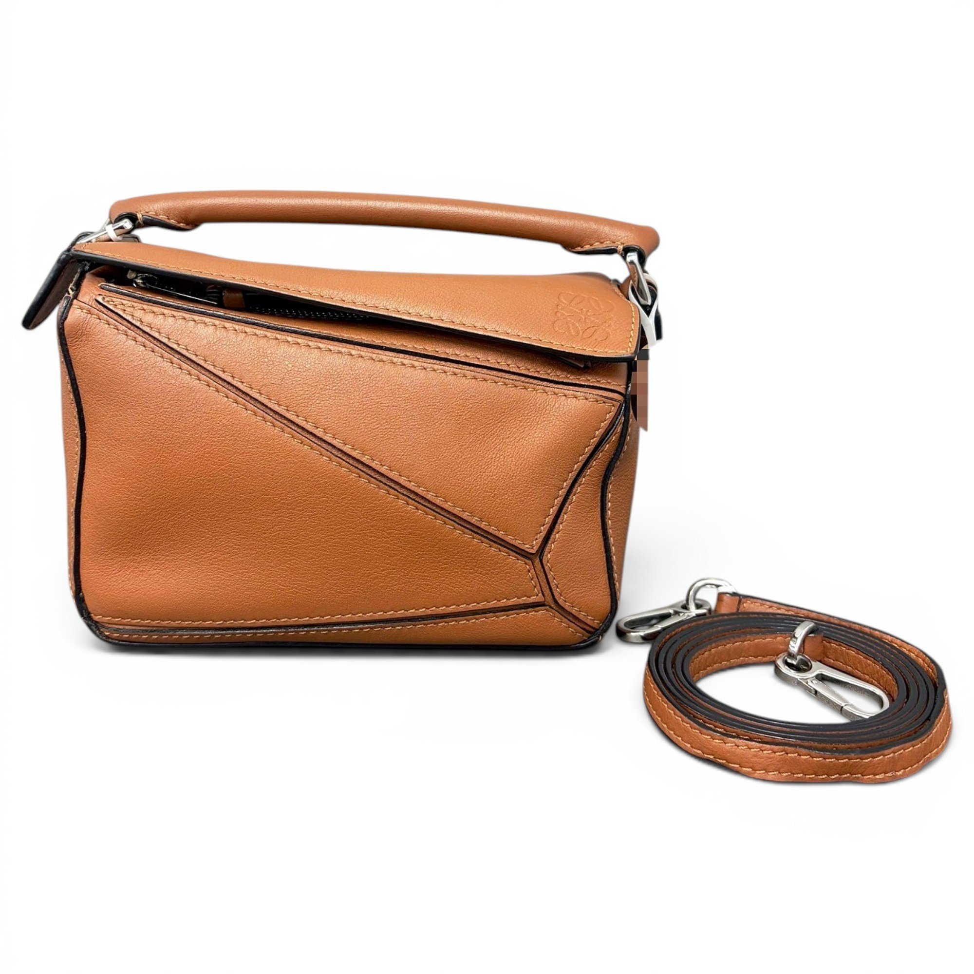 Puzzle leather handbag