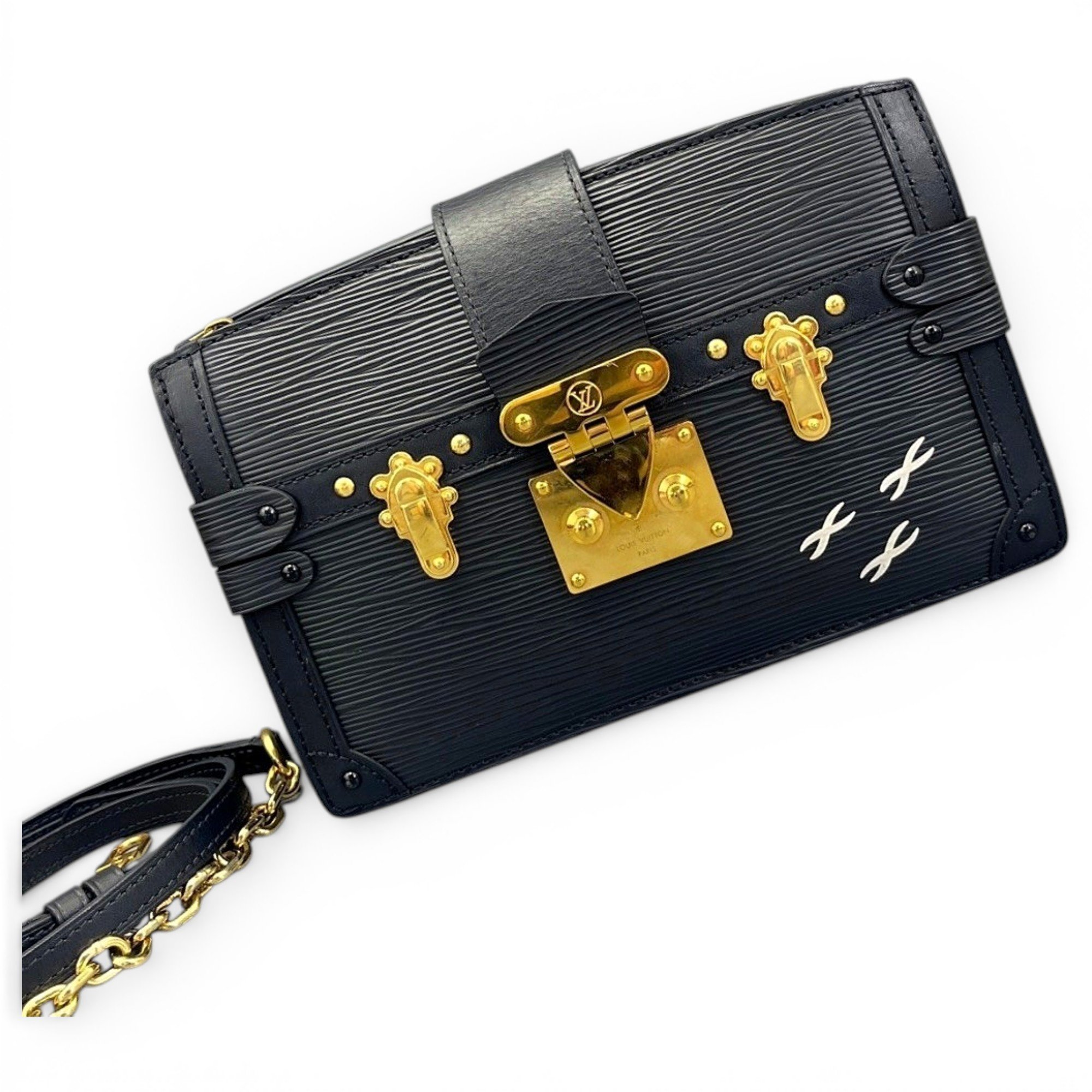Pochette Trunk leather handbag