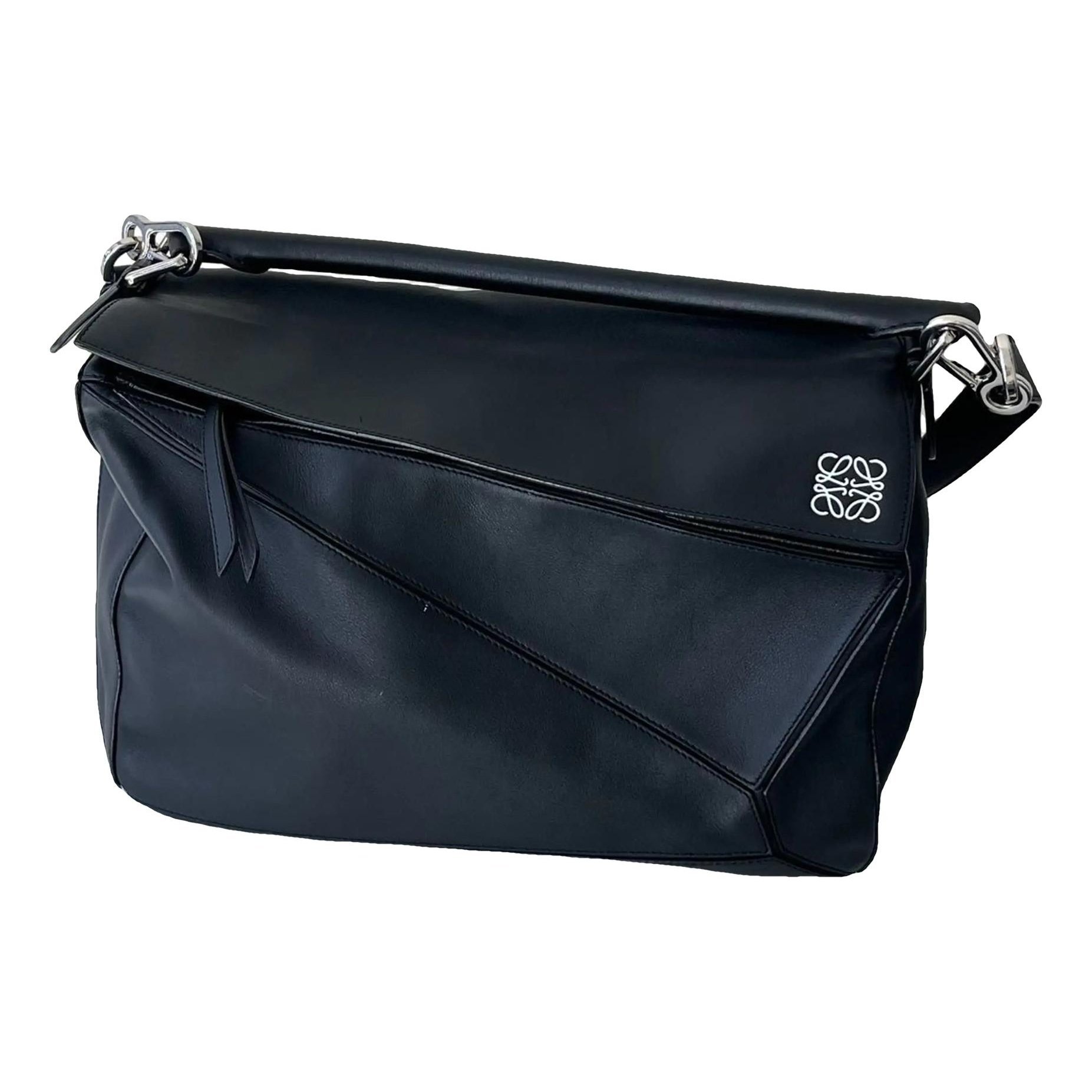 Puzzle leather handbag
