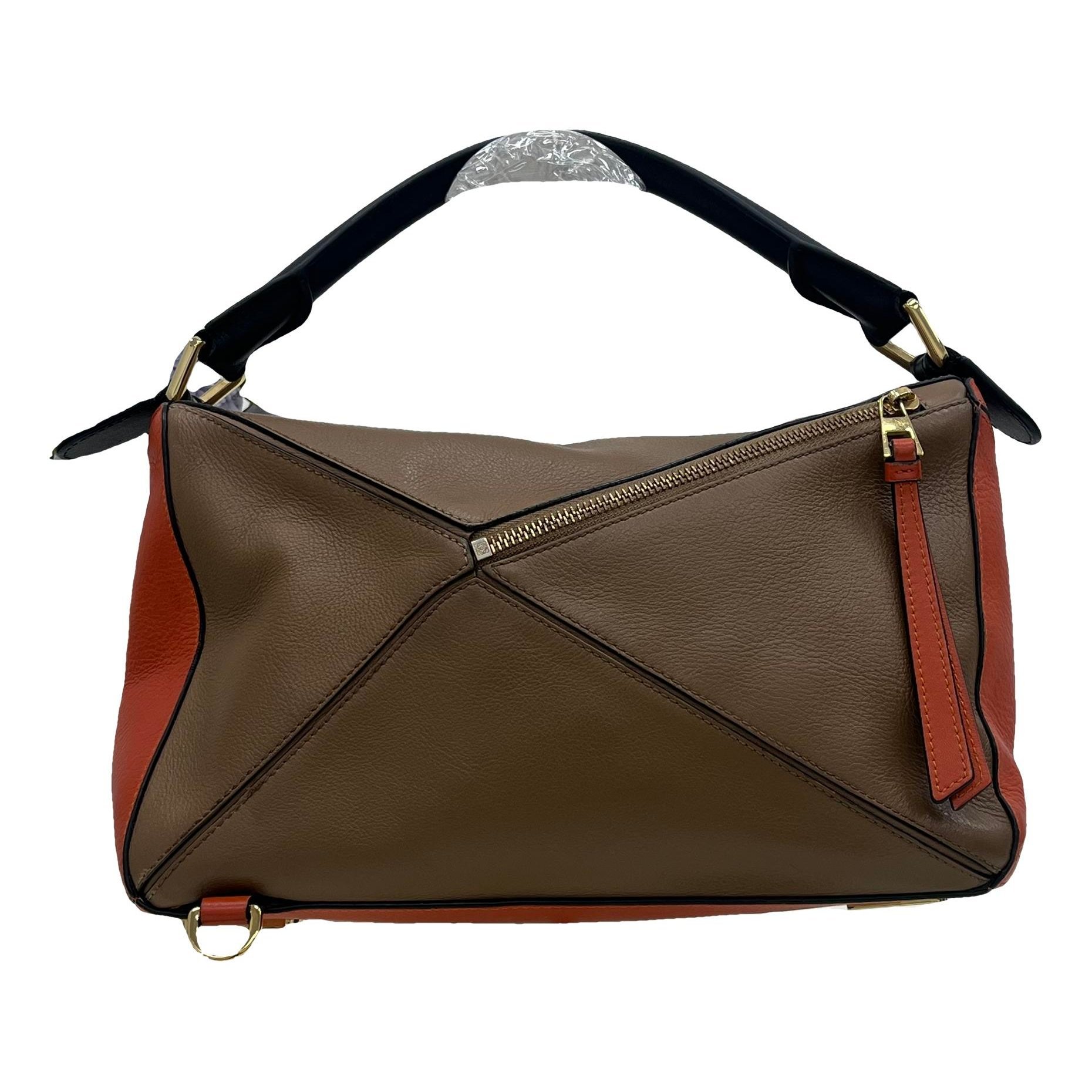 Puzzle leather handbag