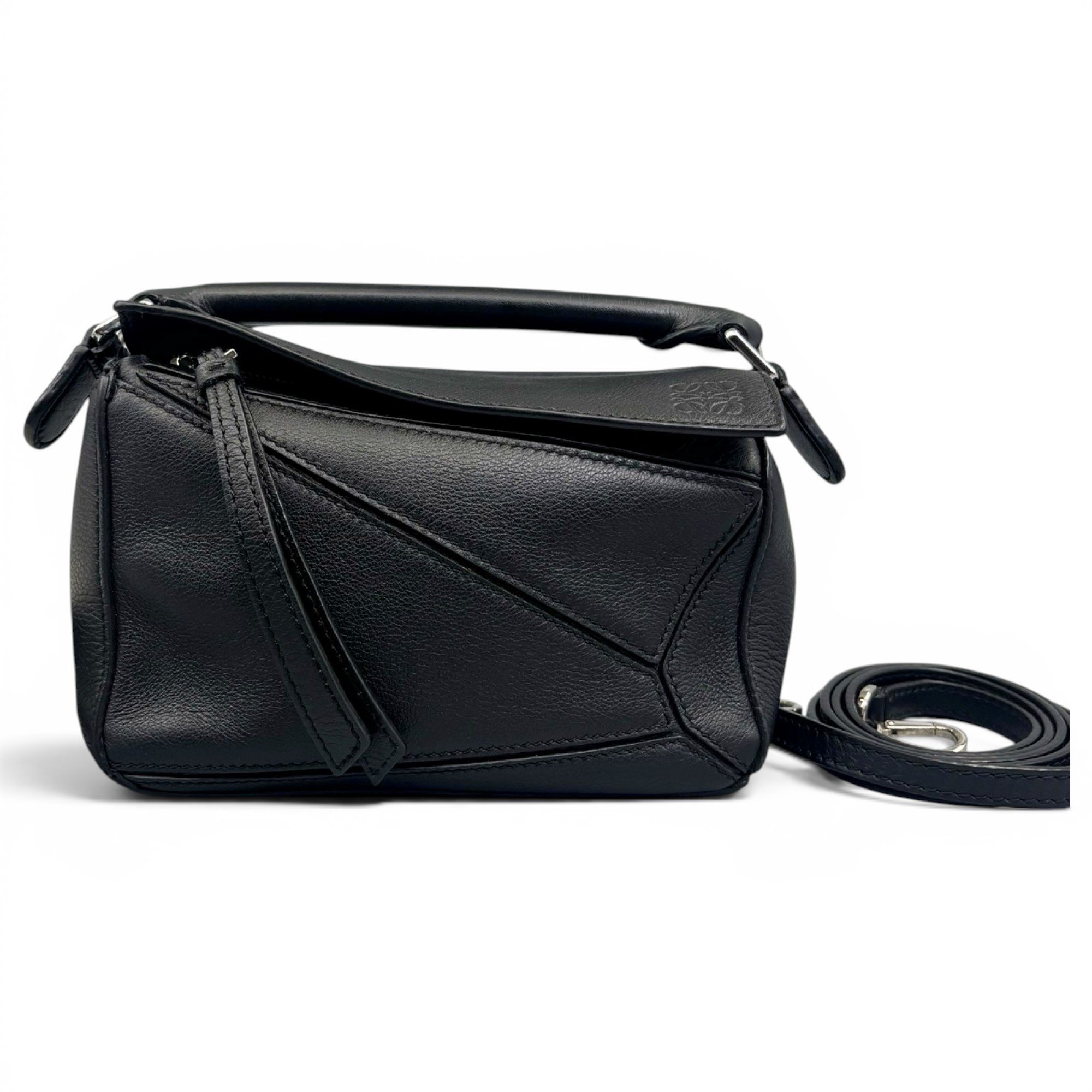 Puzzle leather handbag