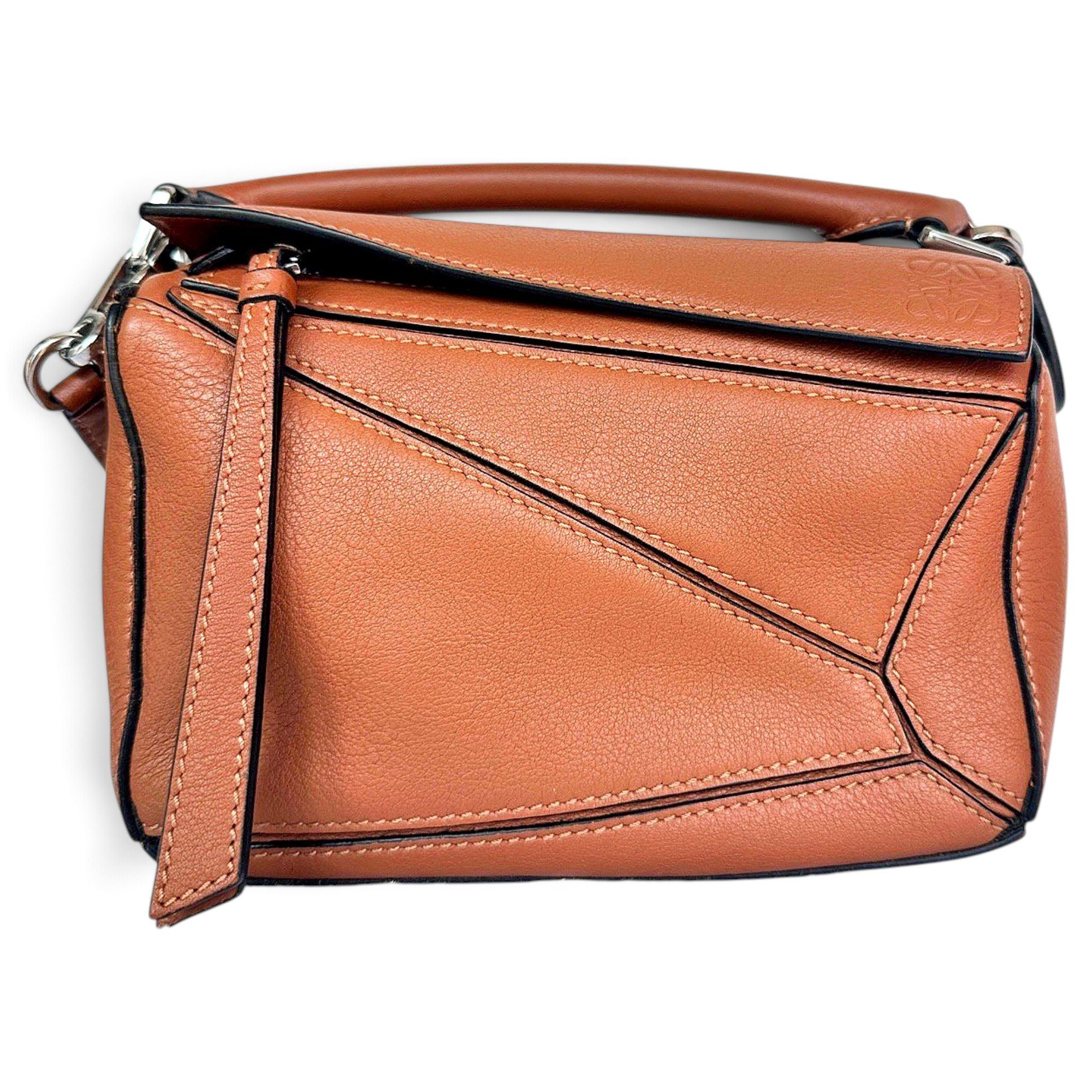 Puzzle leather handbag