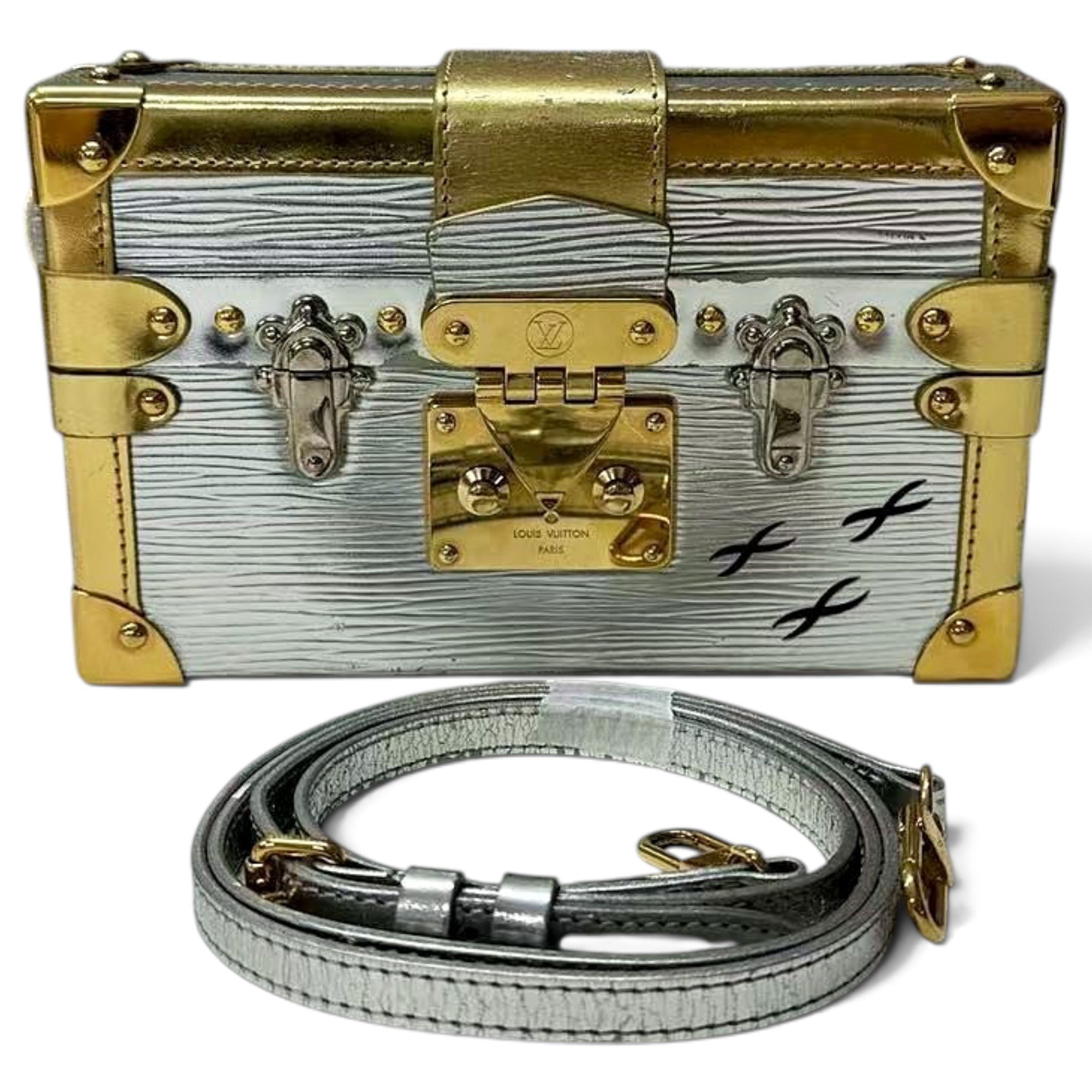 Pochette Trunk leather handbag