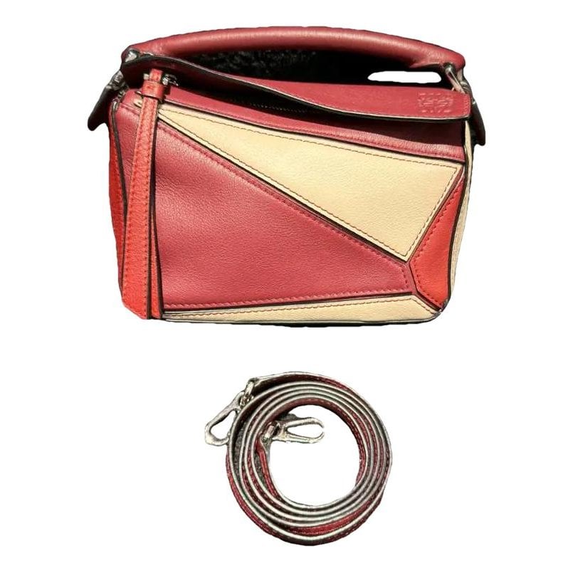 Puzzle leather handbag