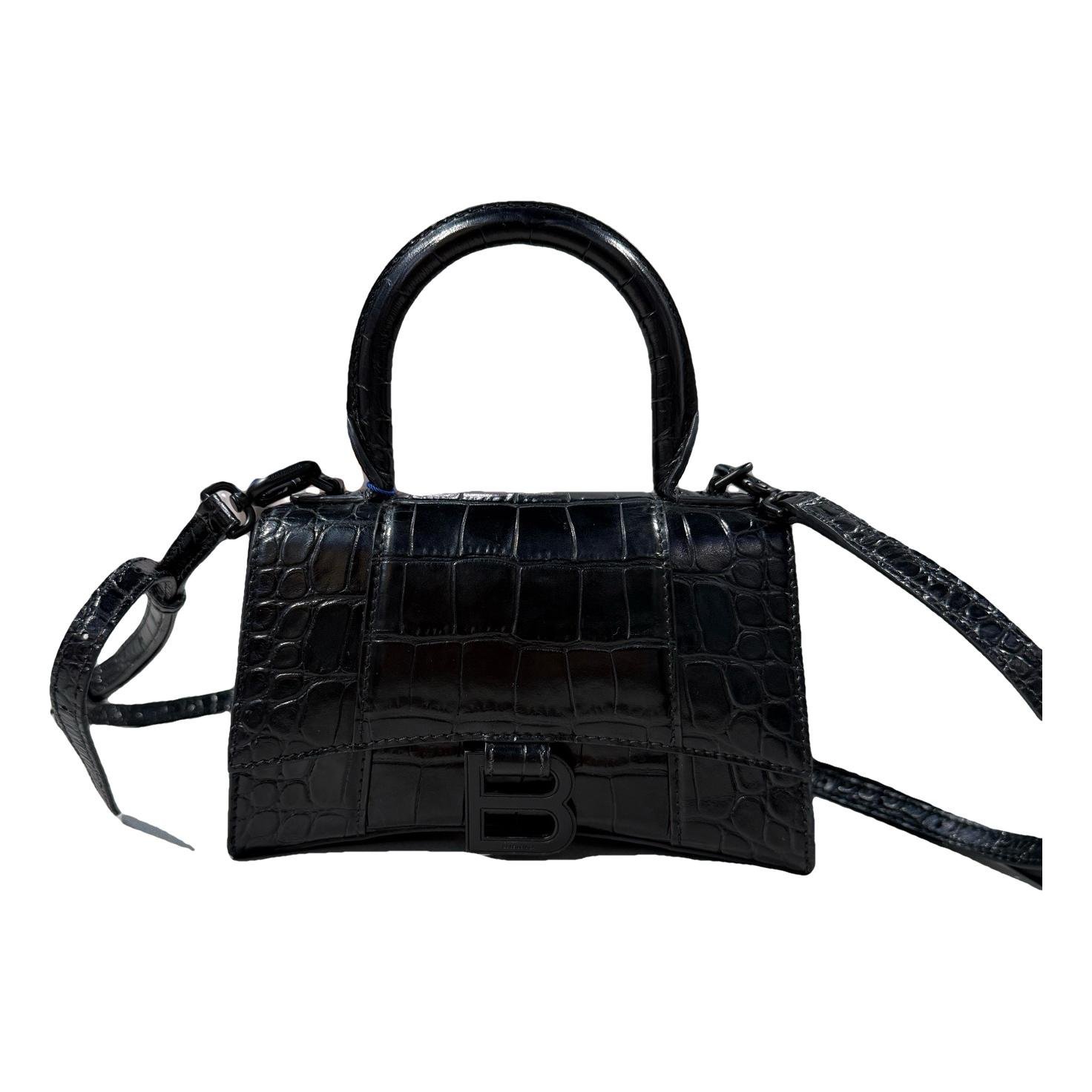 Hourglass leather handbag