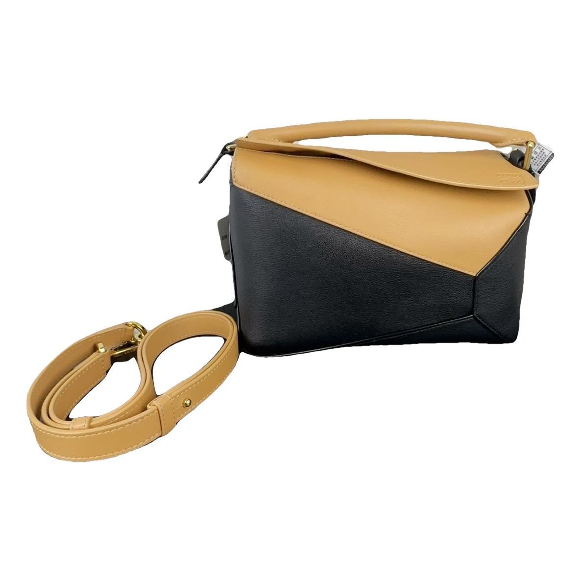 Puzzle leather handbag