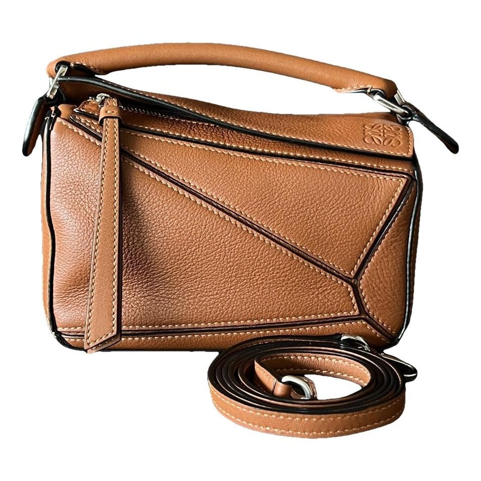 Puzzle leather handbag