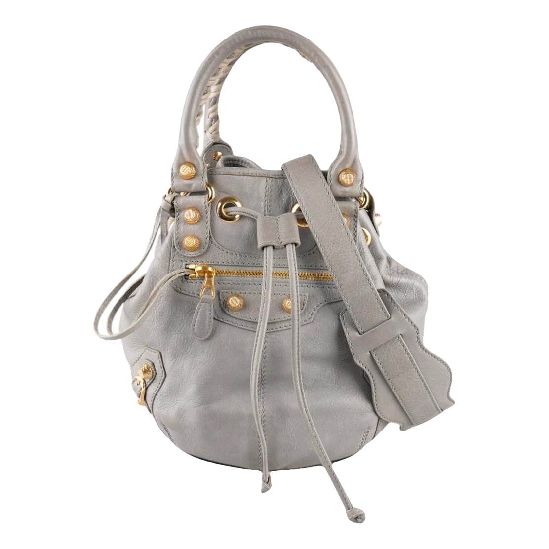 Pompon leather crossbody bag