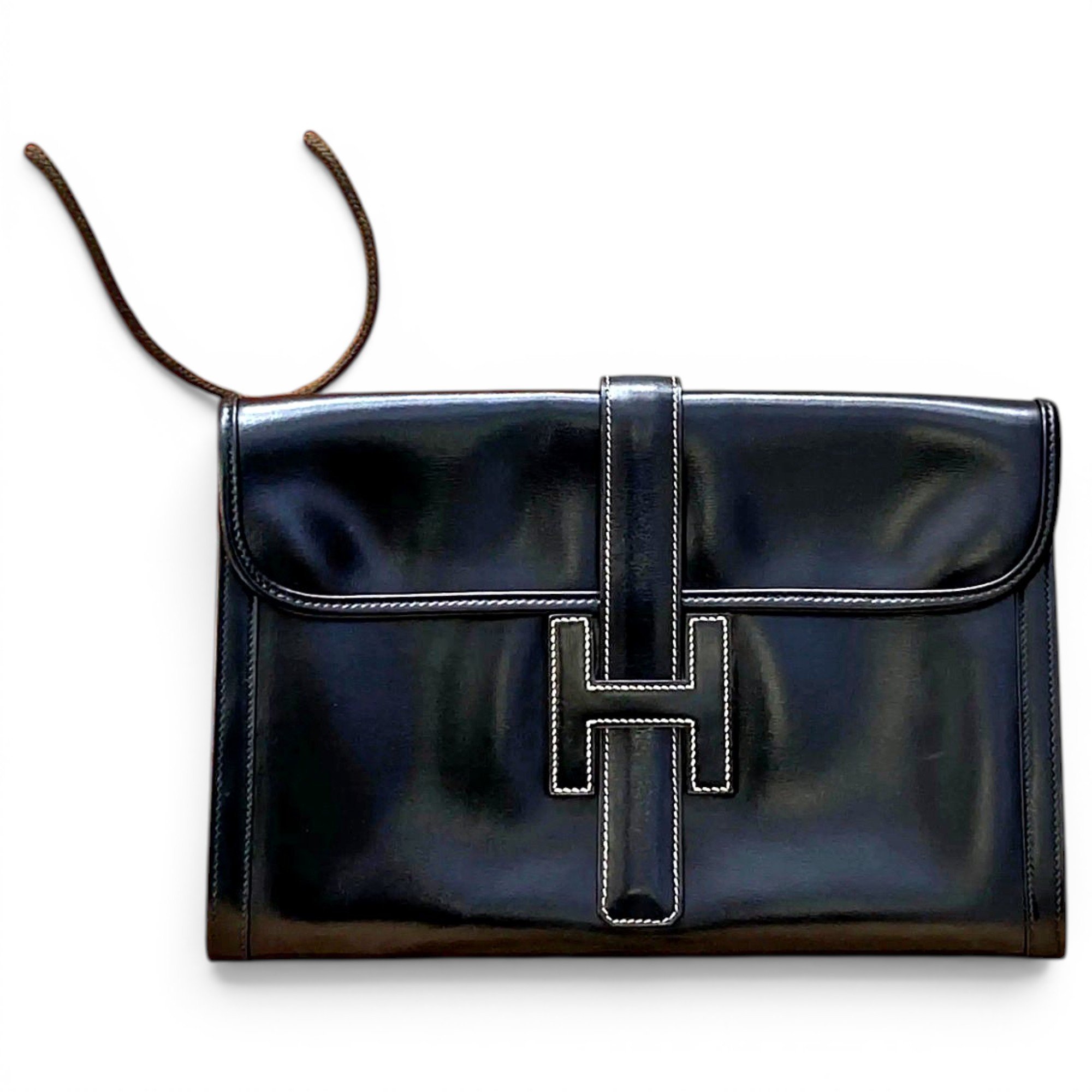 Jige leather clutch bag