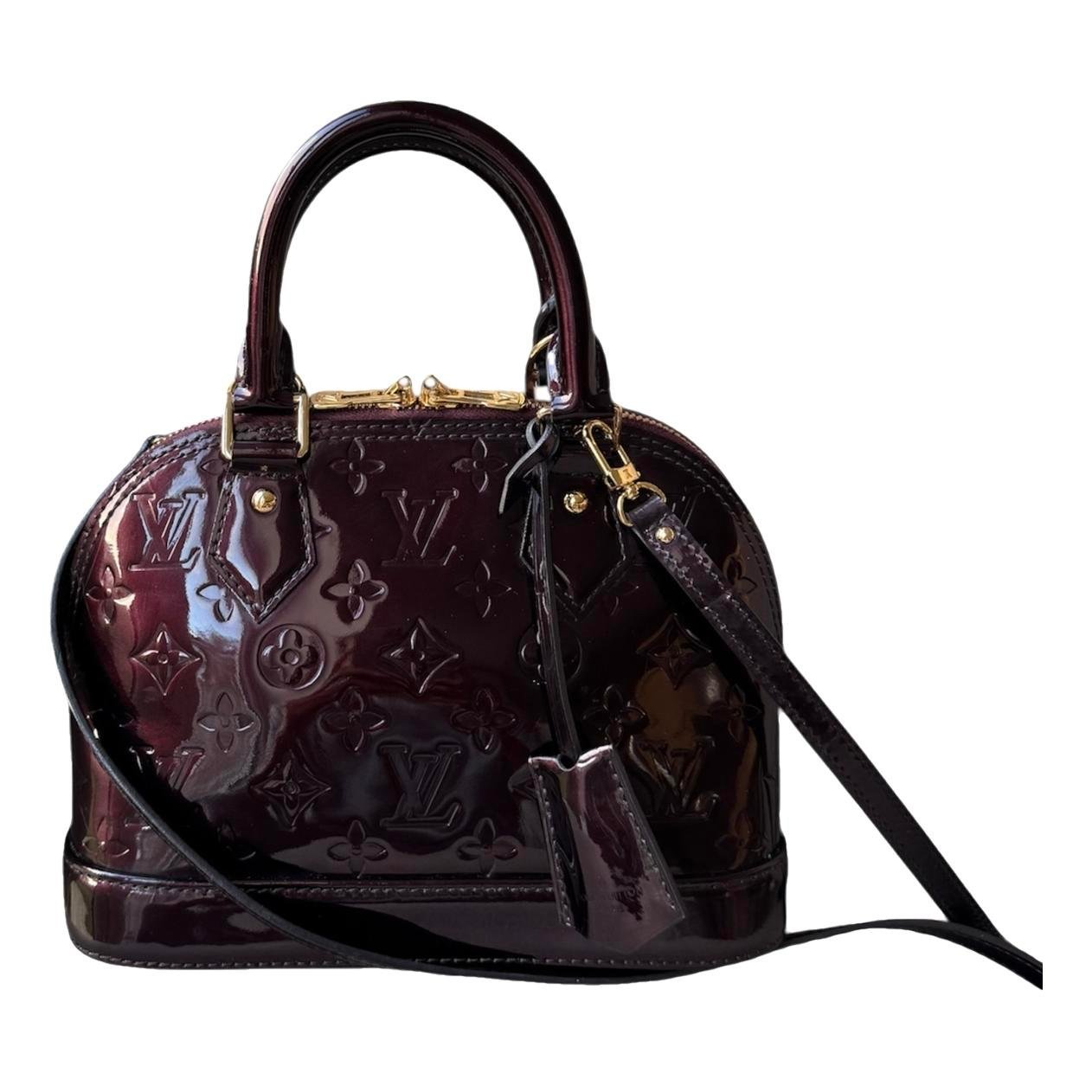 Louis Vuitton Alma BB patent leather handbag
