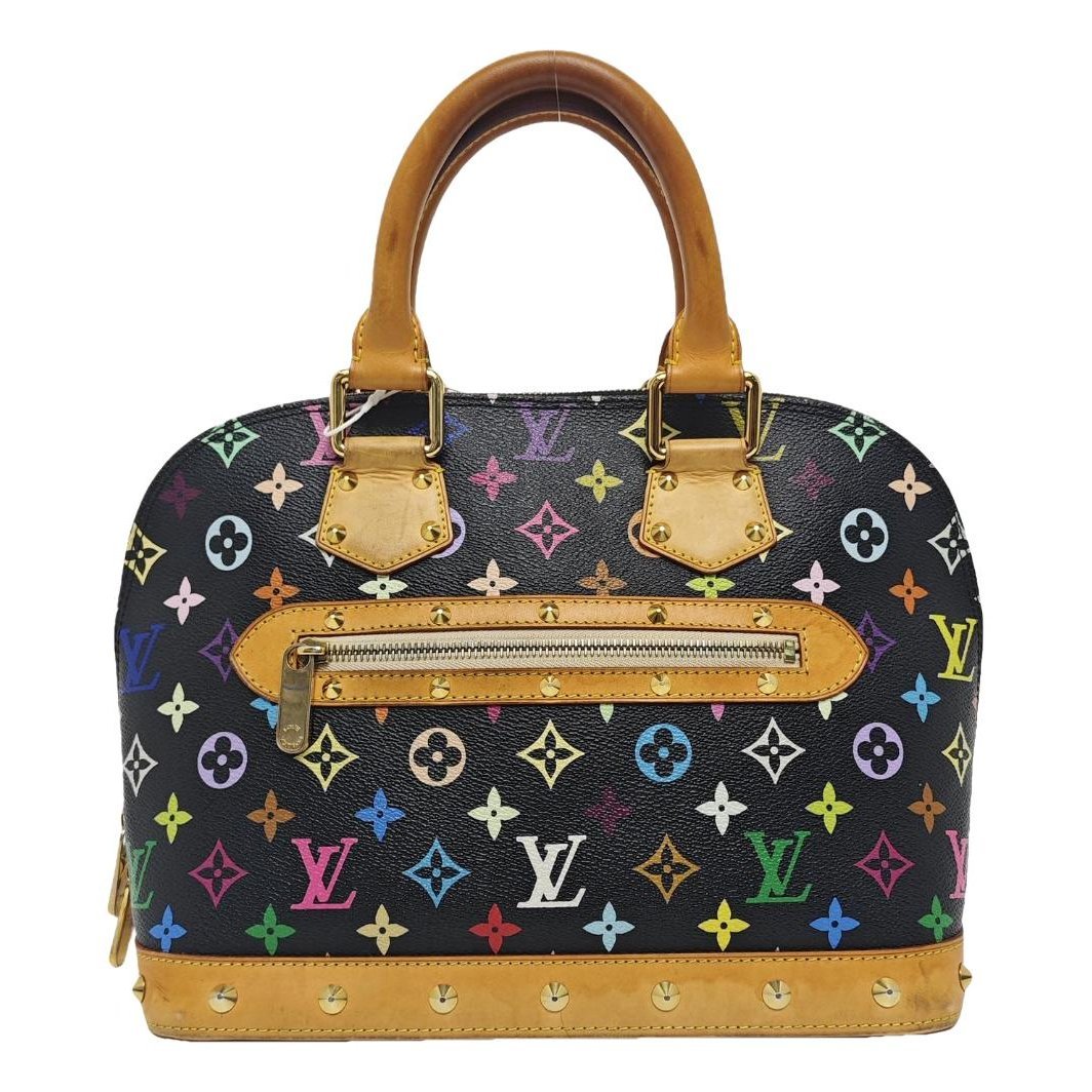 Louis Vuitton Alma BB cloth handbag