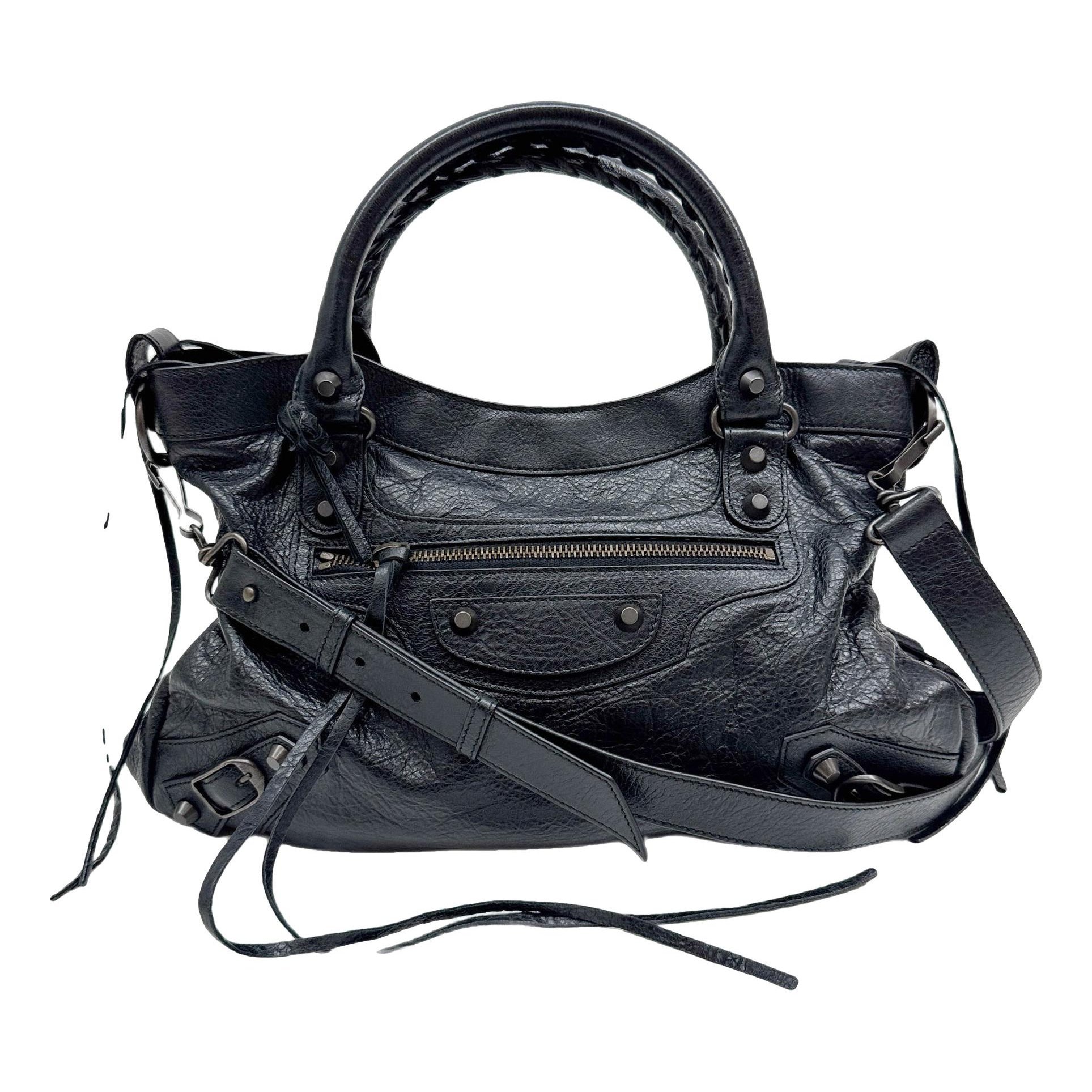 First leather handbag
