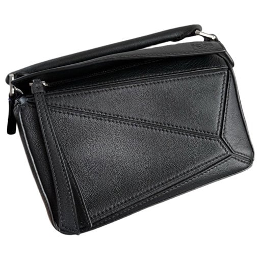 Puzzle leather handbag