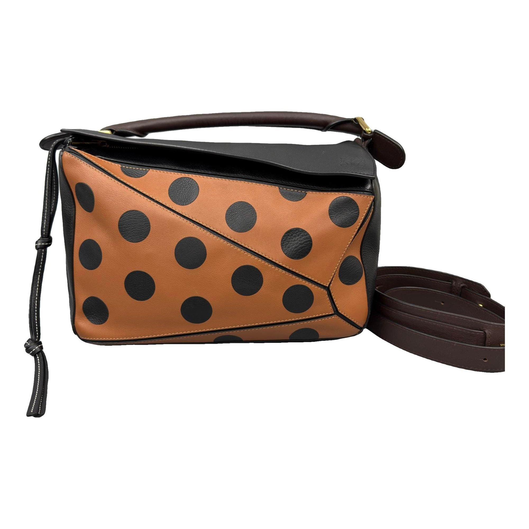 Puzzle leather handbag