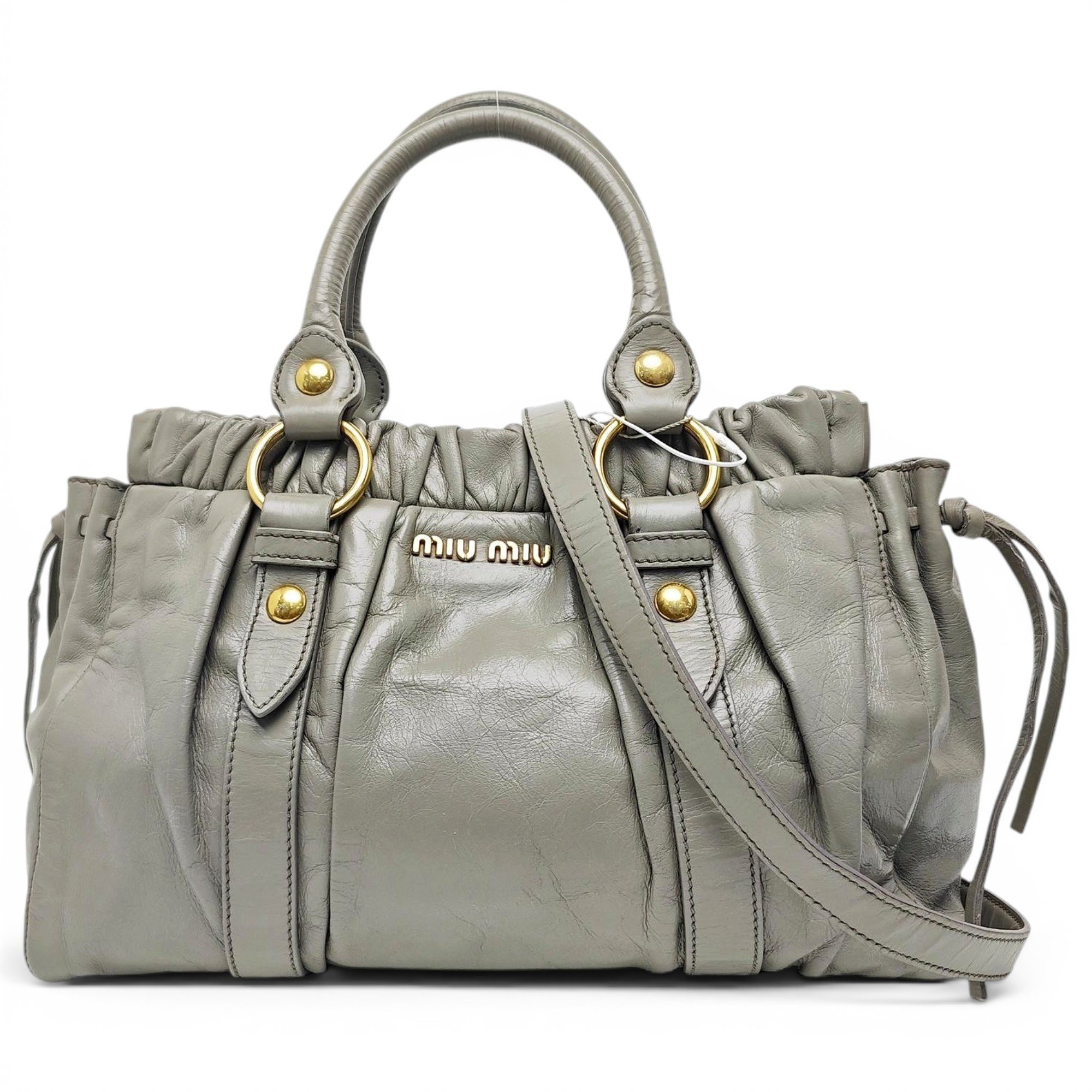 Bow bag leather handbag