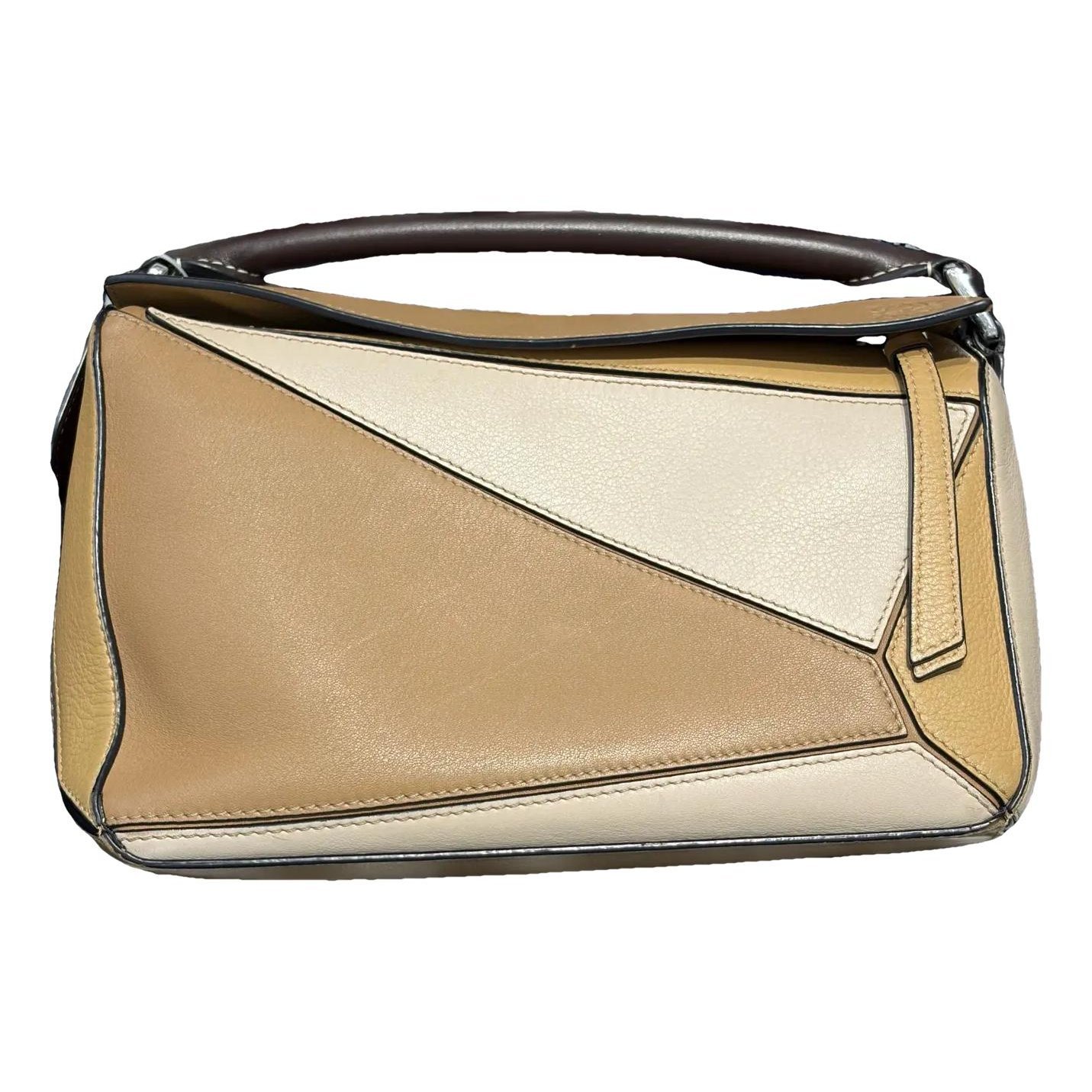 Puzzle leather handbag