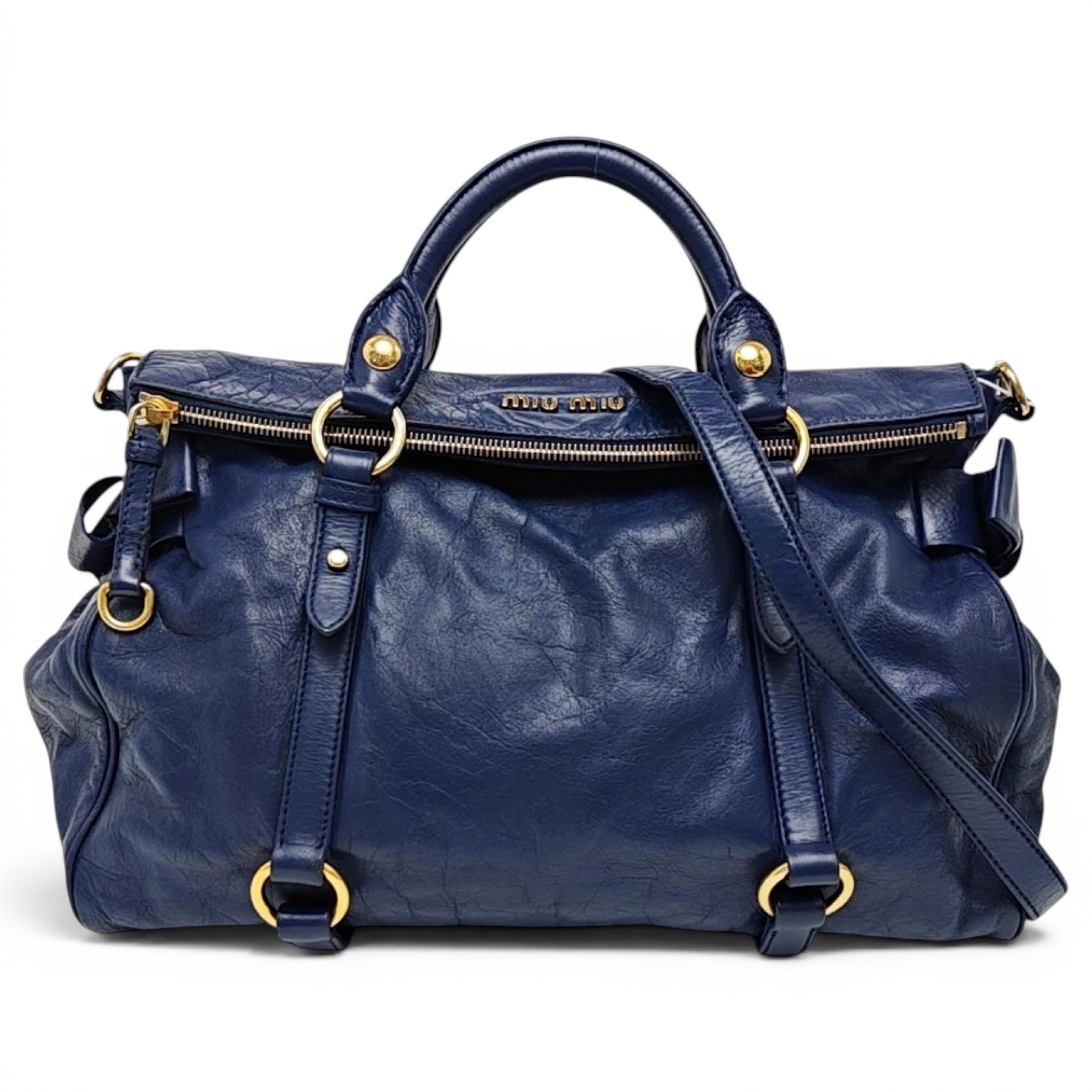 Bow bag leather handbag