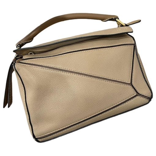 Puzzle leather handbag