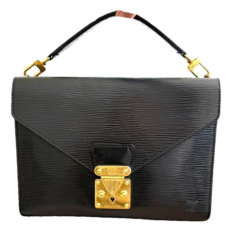 Biface patent leather handbag