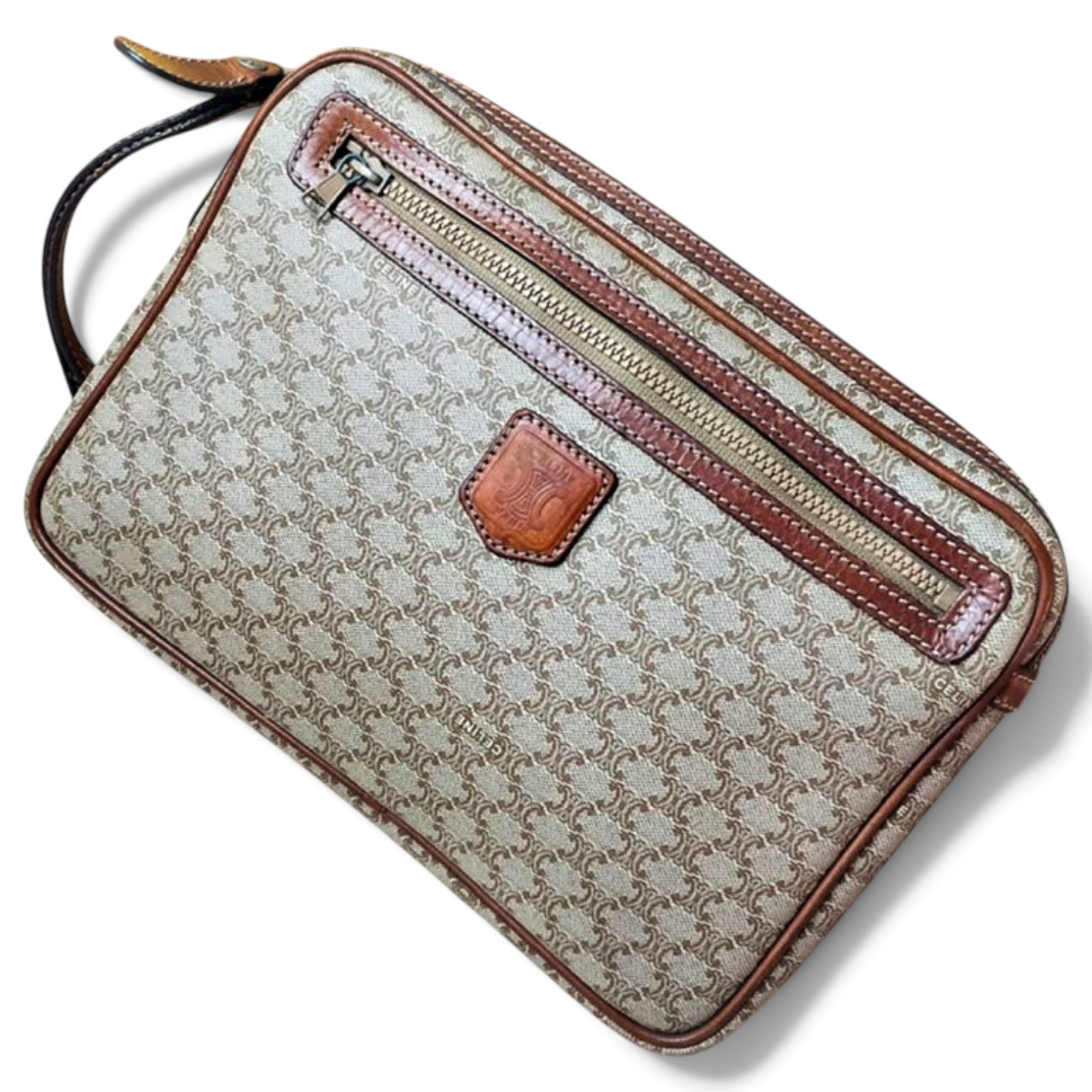 Triomphe Vintage leather clutch bag