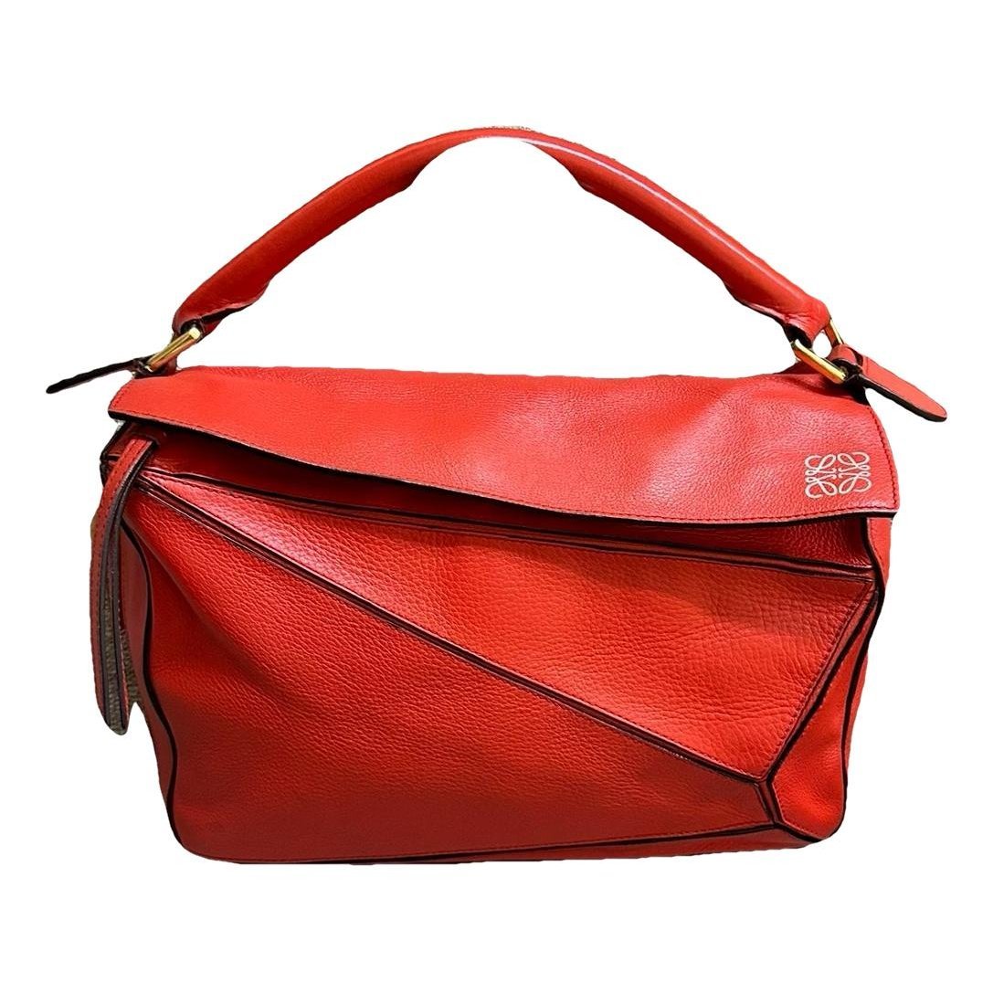 Puzzle leather handbag