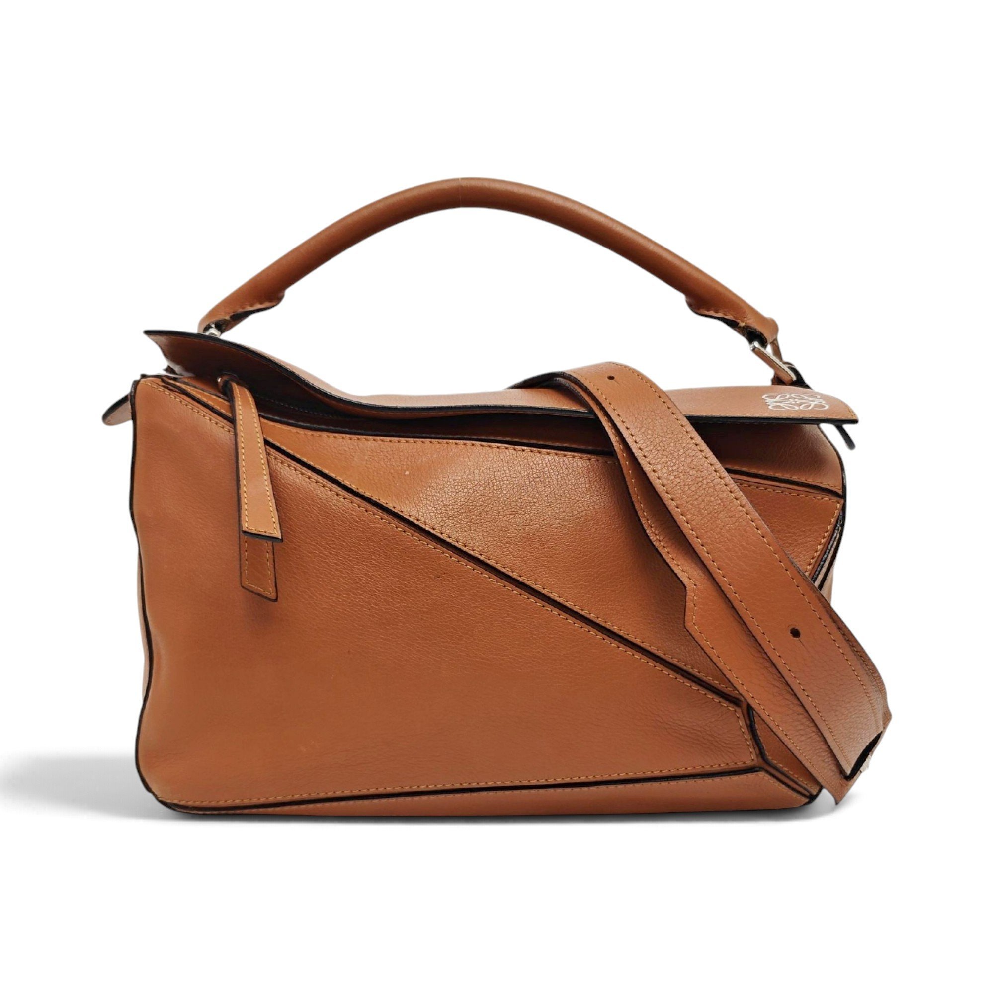 Puzzle leather handbag