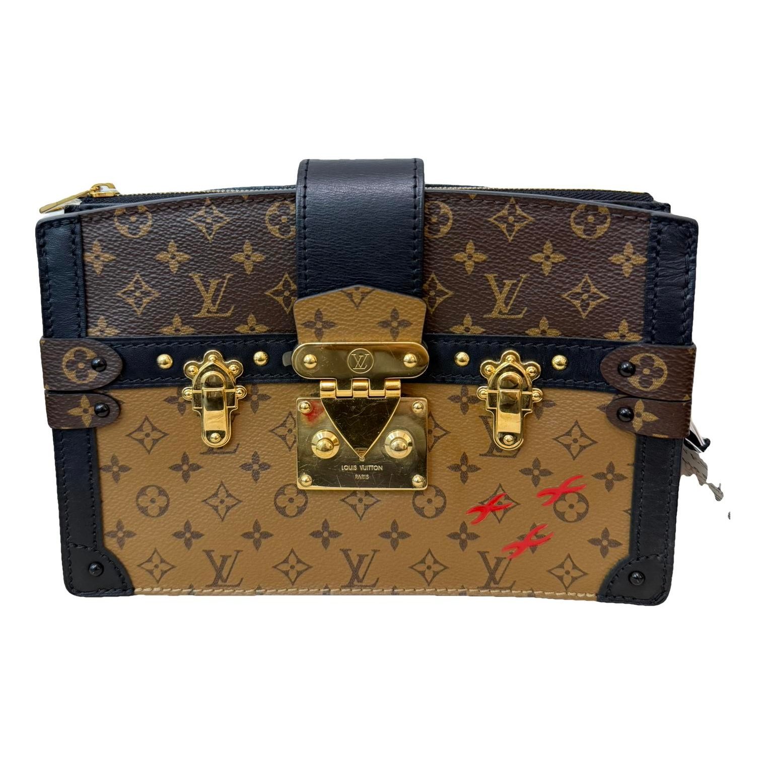 Pochette Trunk leather handbag