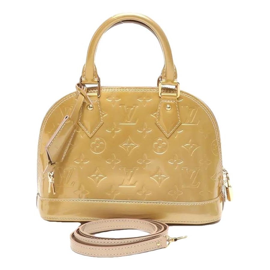 Alma BB patent leather handbag