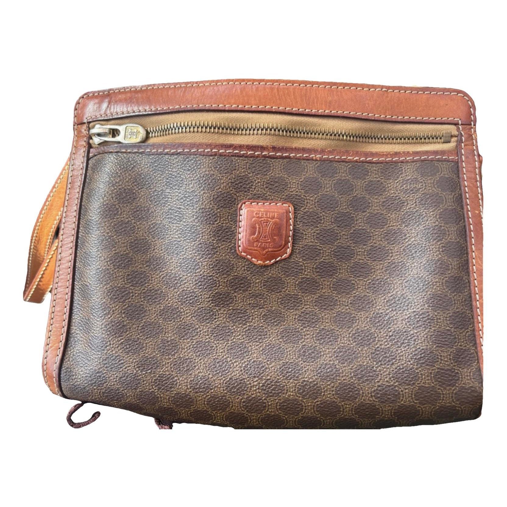 Triomphe Vintage leather clutch bag