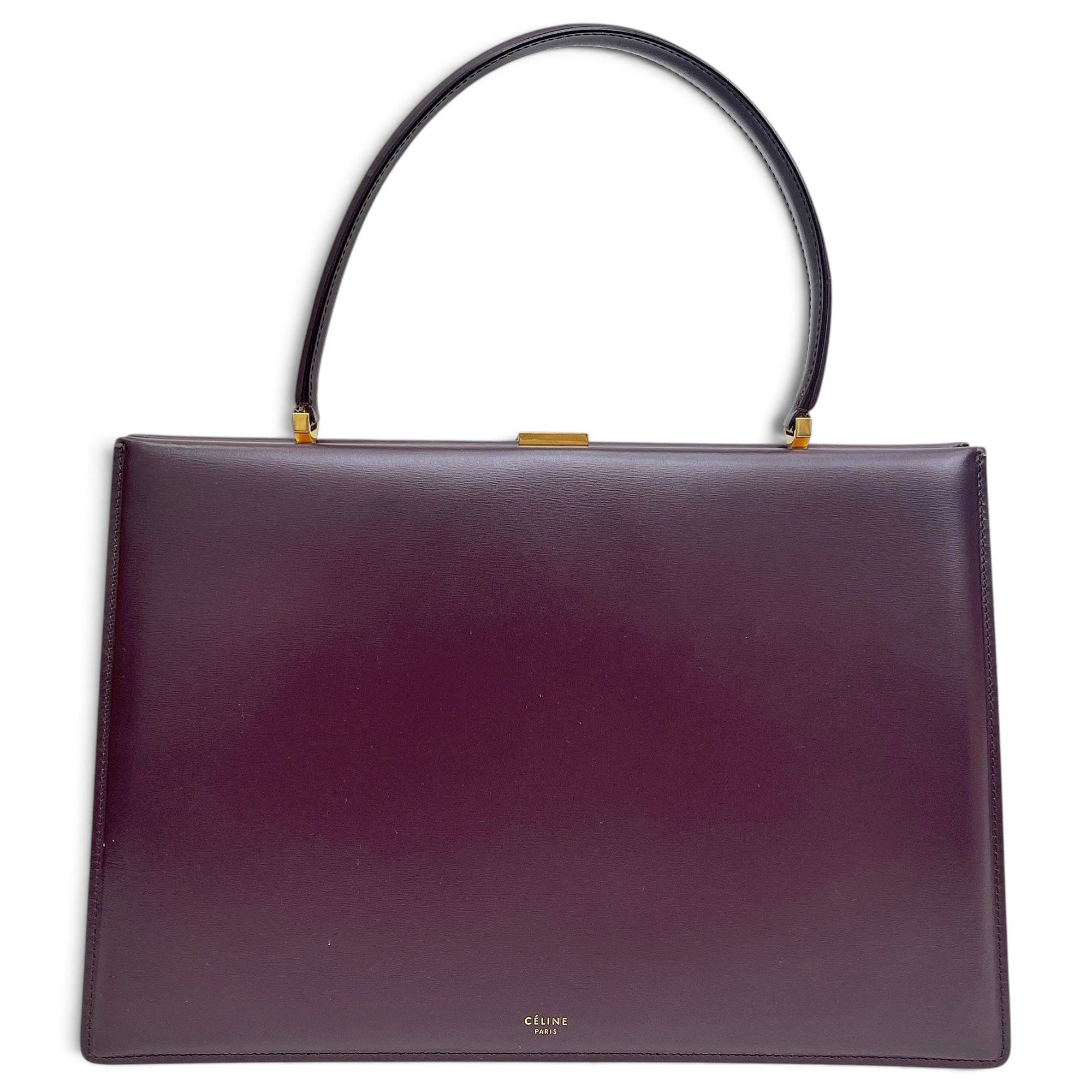 Clasp leather handbag
