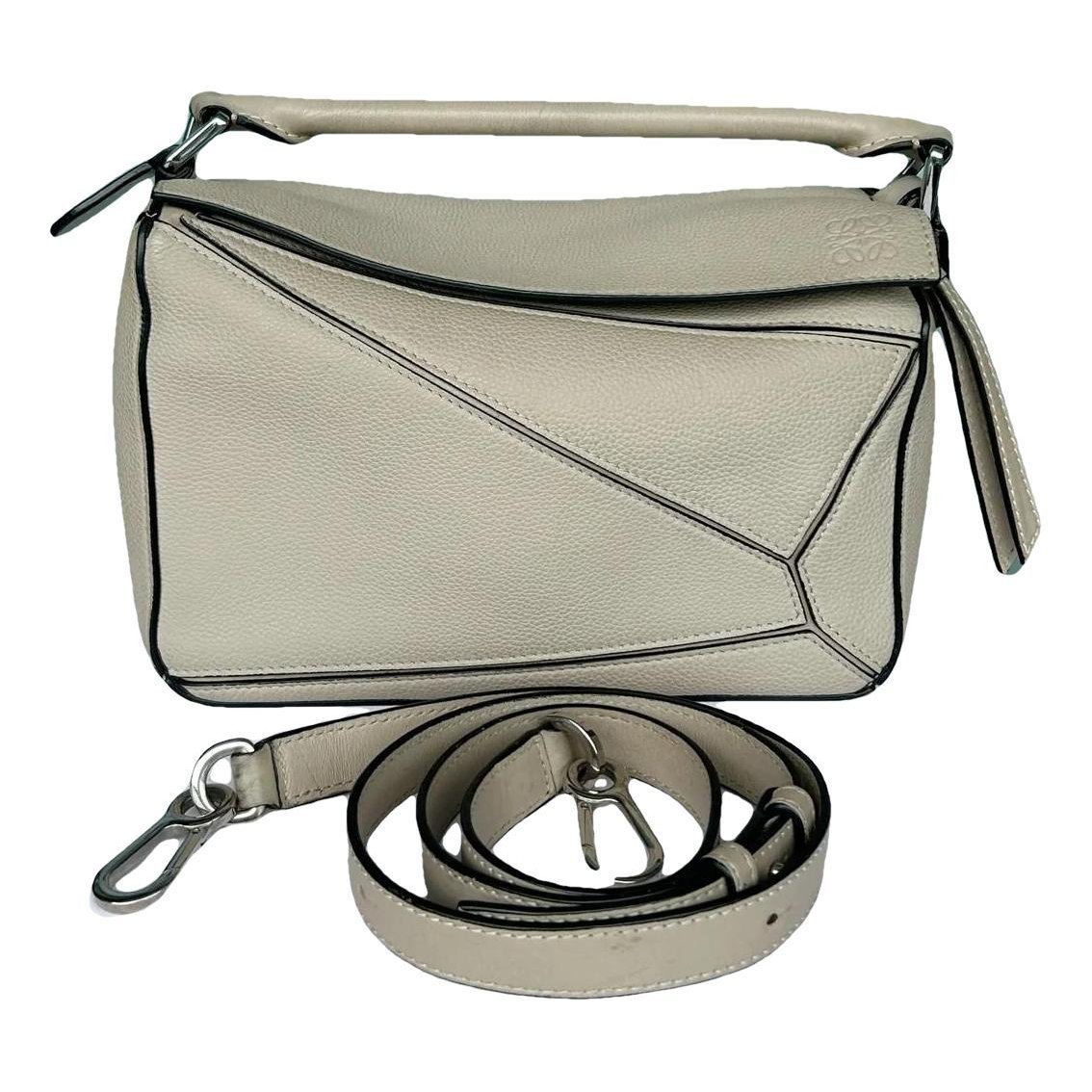 Puzzle leather crossbody bag