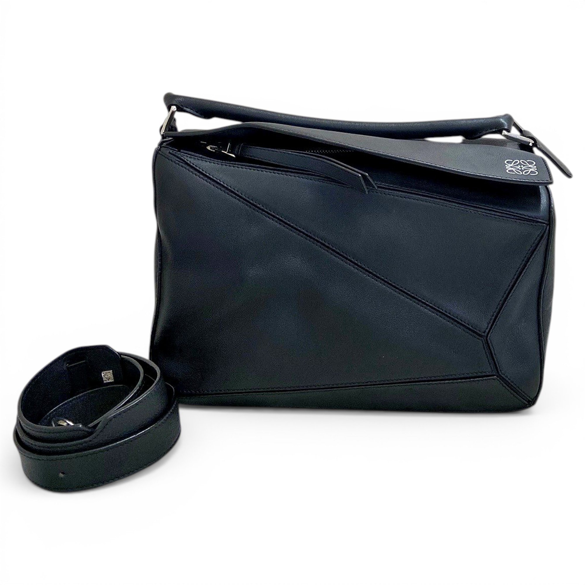 Puzzle leather handbag