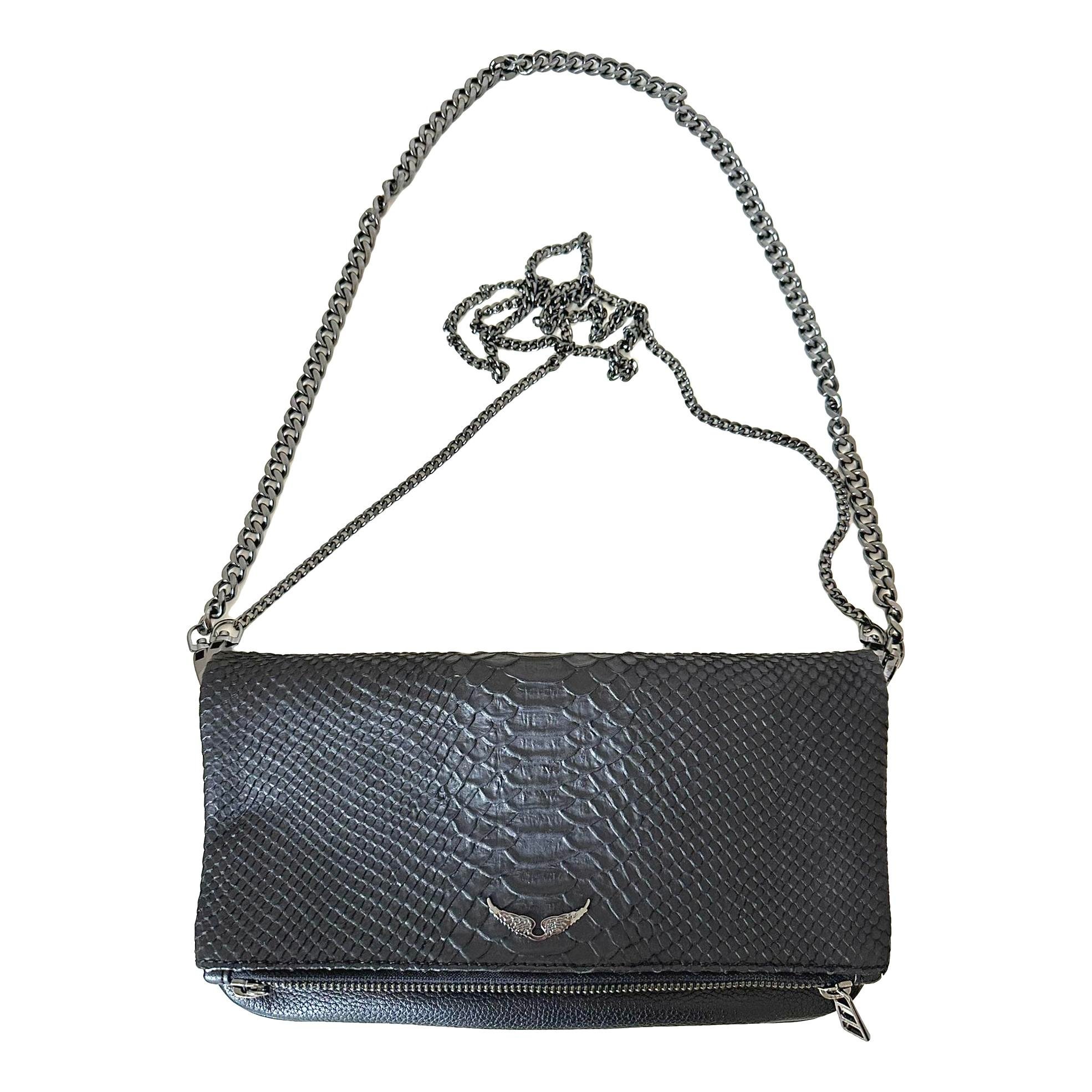 Rock leather clutch bag