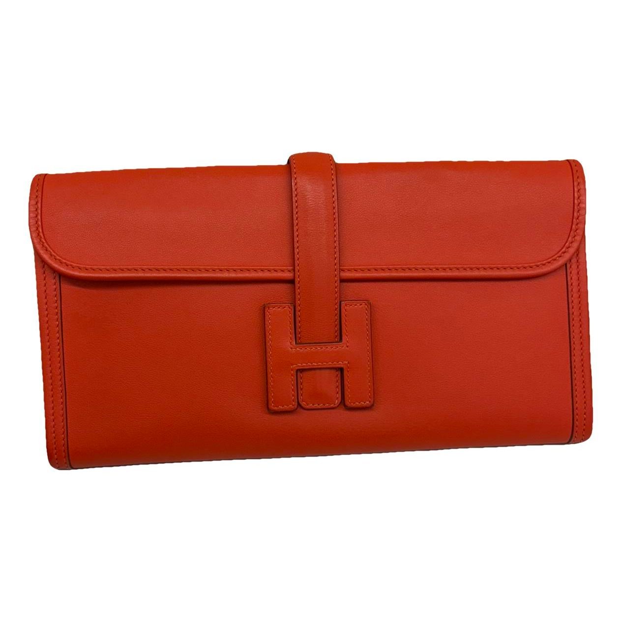 Jige leather clutch bag