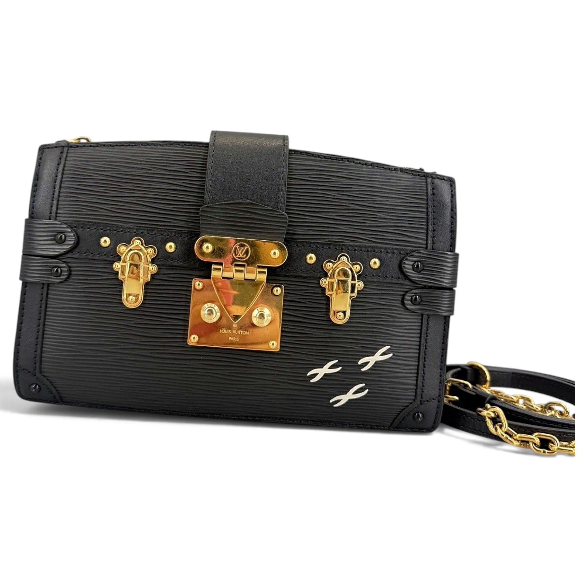 Pochette Trunk leather handbag